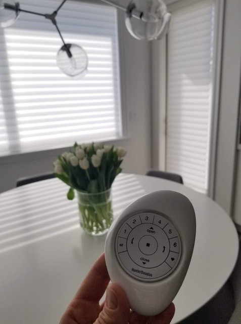 Image of KHD Homes control window coverings with remote for interior design and layout design renovations.