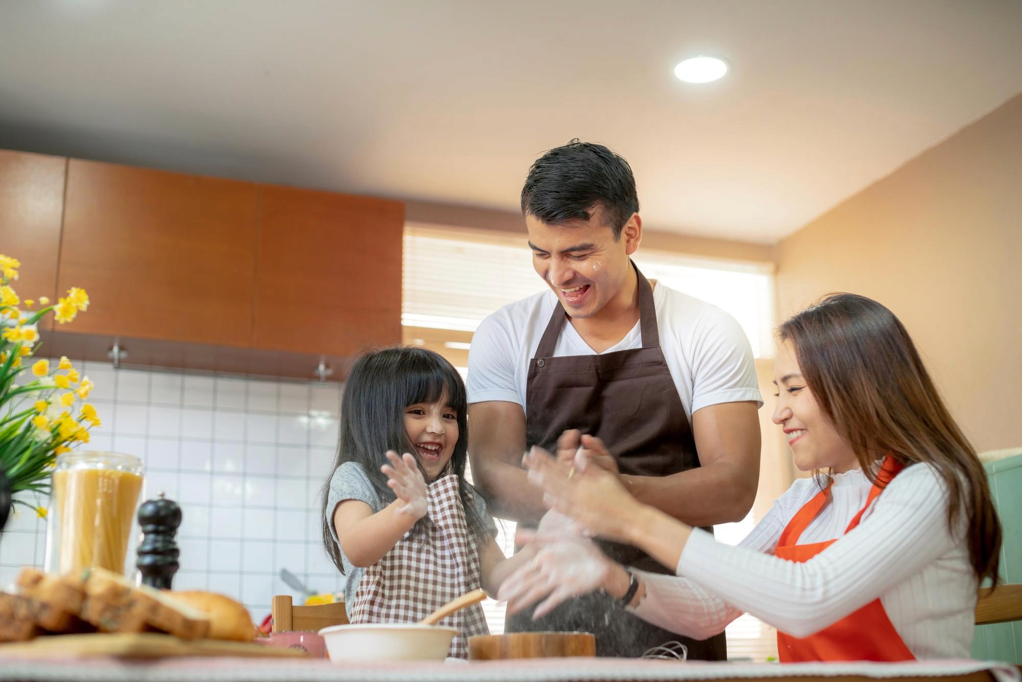 family having fun while cooking