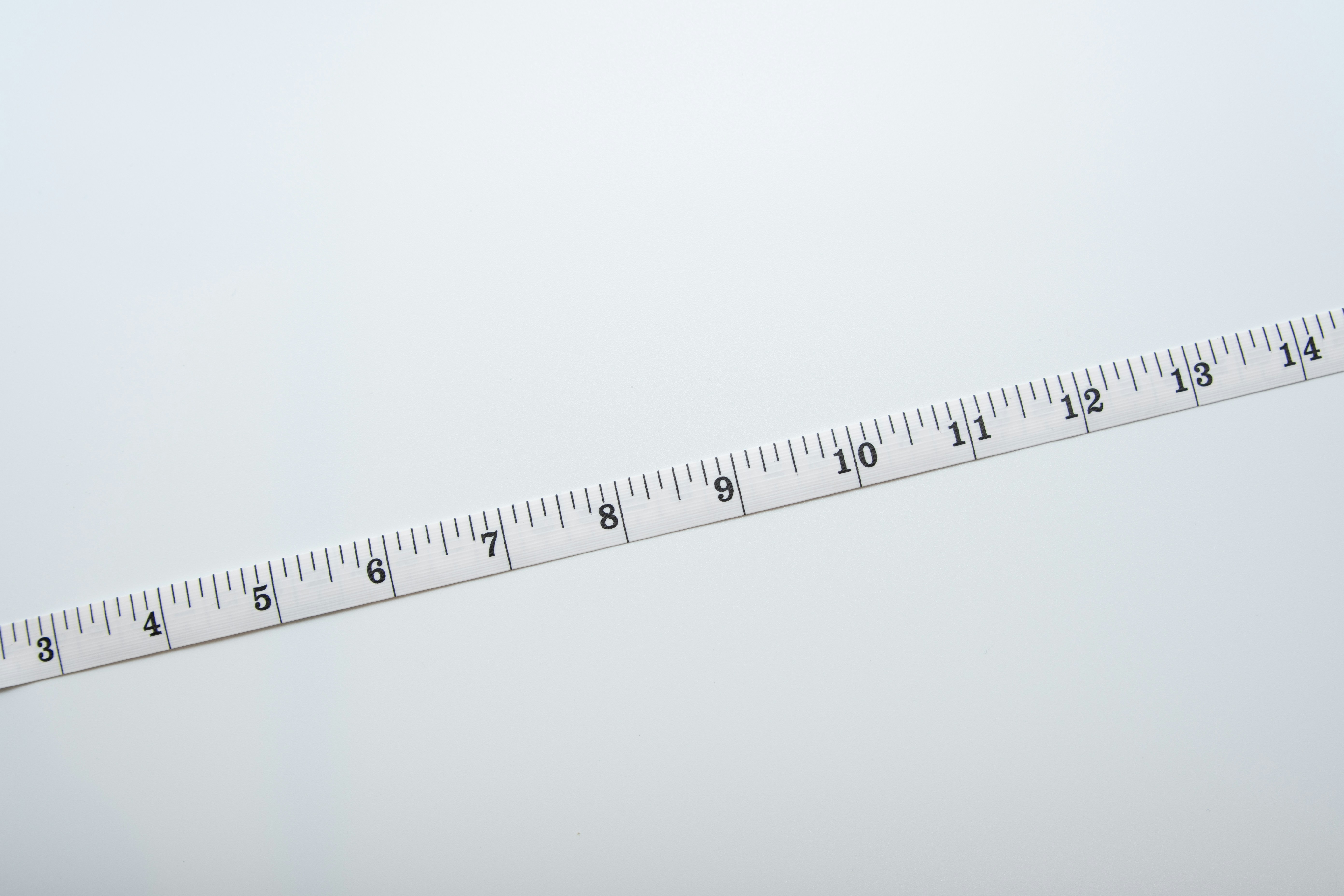 a measuring tape with a white background