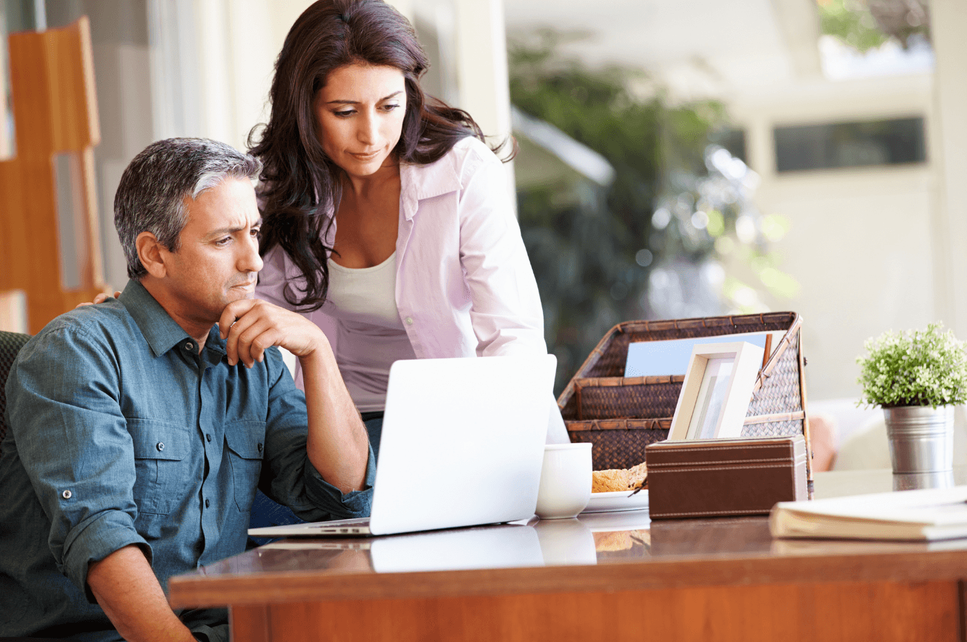 Couple Using Laptop