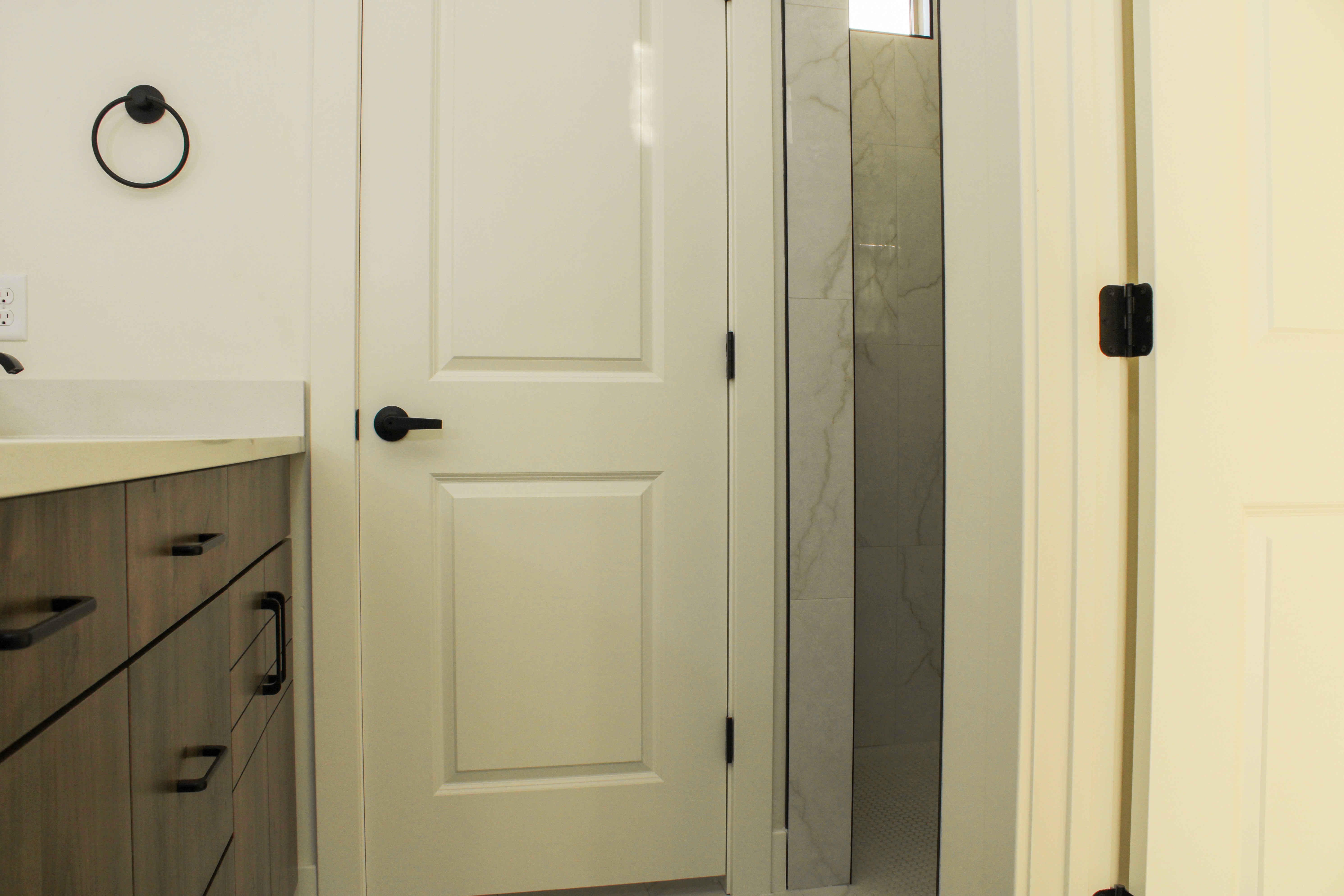 Primary bathroom inside the Golden Hour home in Hurricane, Utah with vanity and modern finishes.
