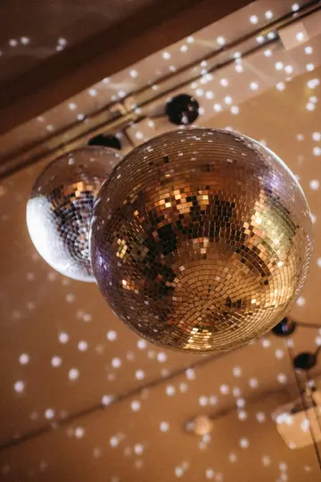 gold round ball on white and brown polka dot textile for events