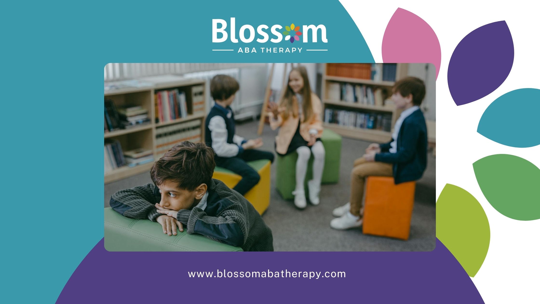 An autistic boy sits apart from a group of children in a library, appearing sad and withdrawn in GA.