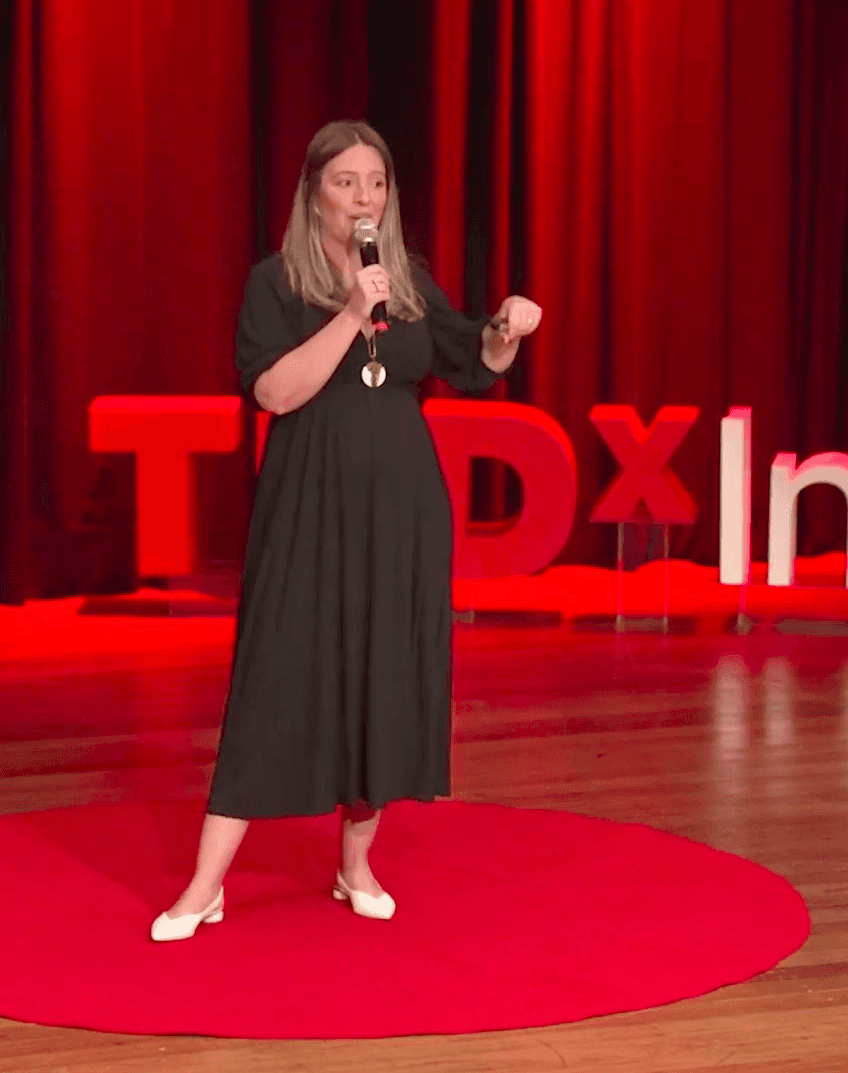 Woman lecture in TEDx