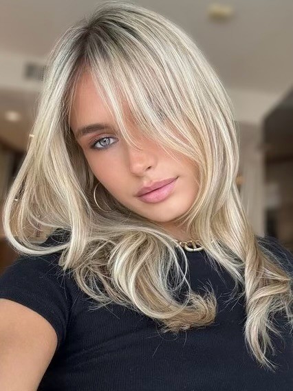 Blended Bright blonde with root smudge at Bomane Salon – dimensional, natural-looking blonde for effortless grow-out.