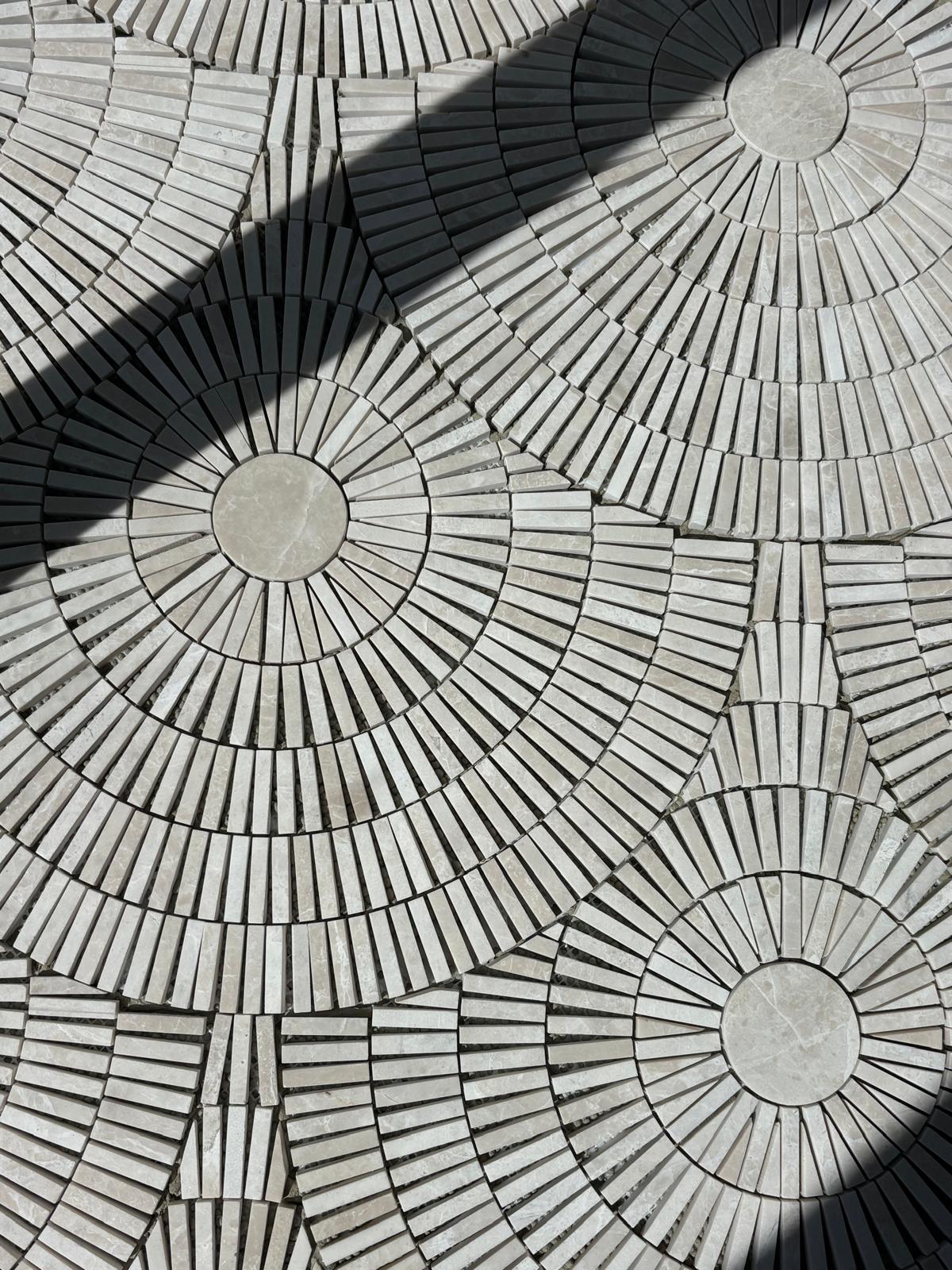 a blurry photo of a person standing in front of a wall