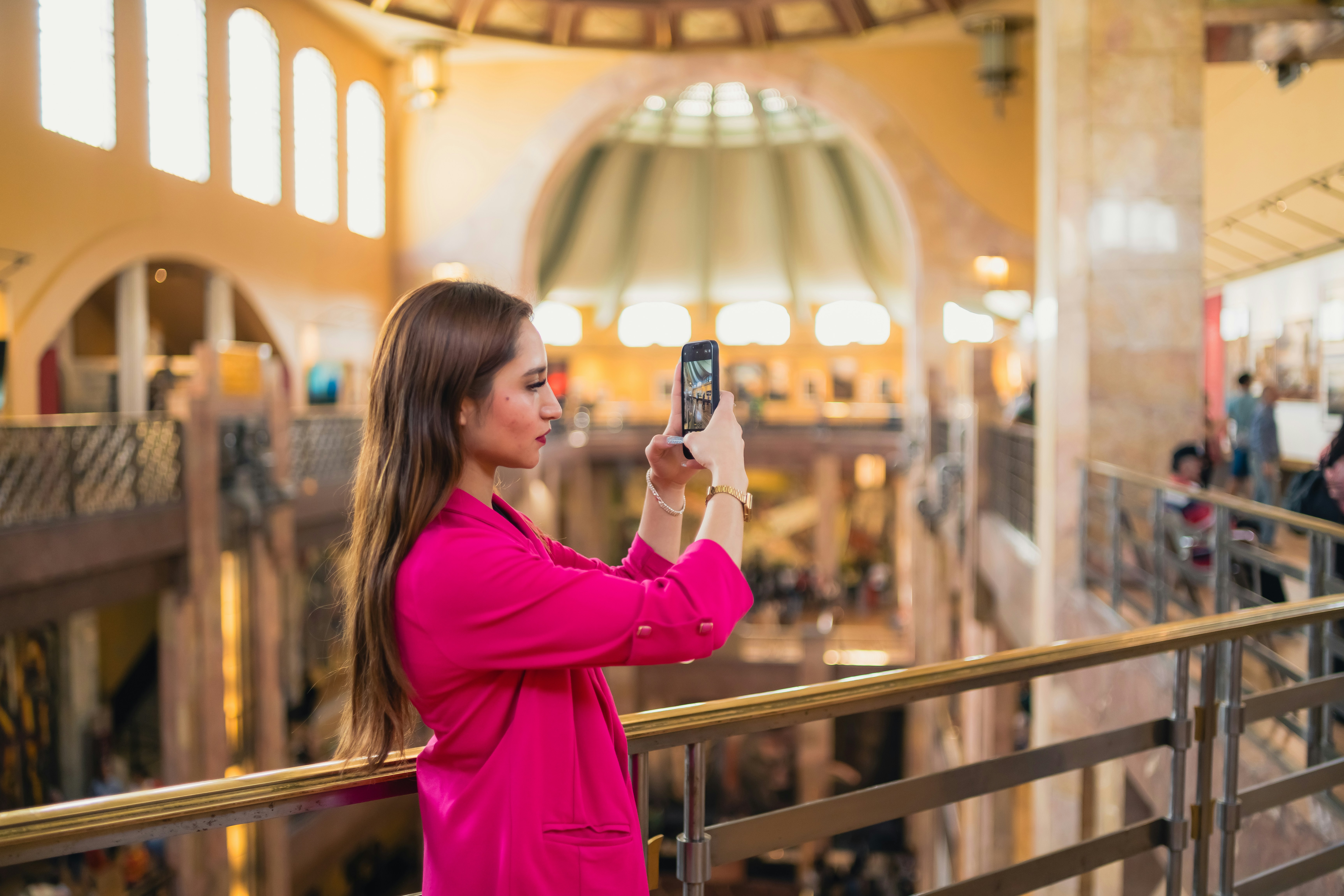 girl taking snap with mobile - Soft Summer Color Analysis