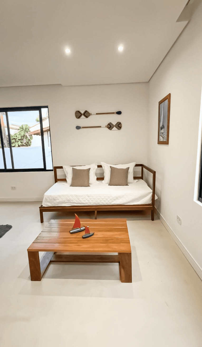 the private hot tub on the balcony, modern design with clean lines and natural materials.