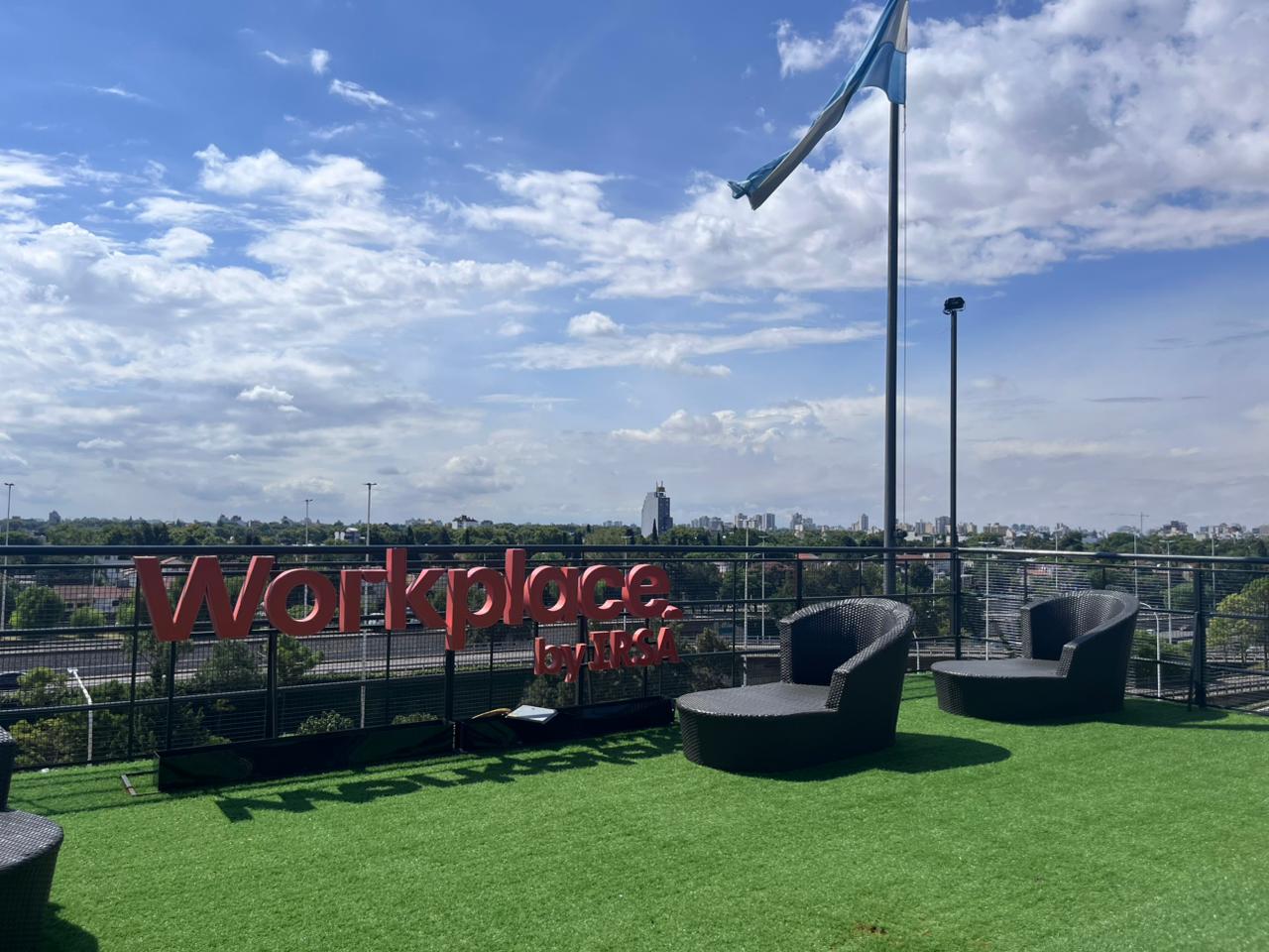 three men sitting on chair beside tables