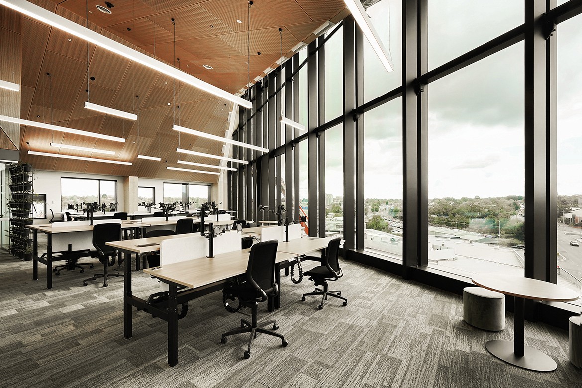 Modern open-plan office with desks and chairs