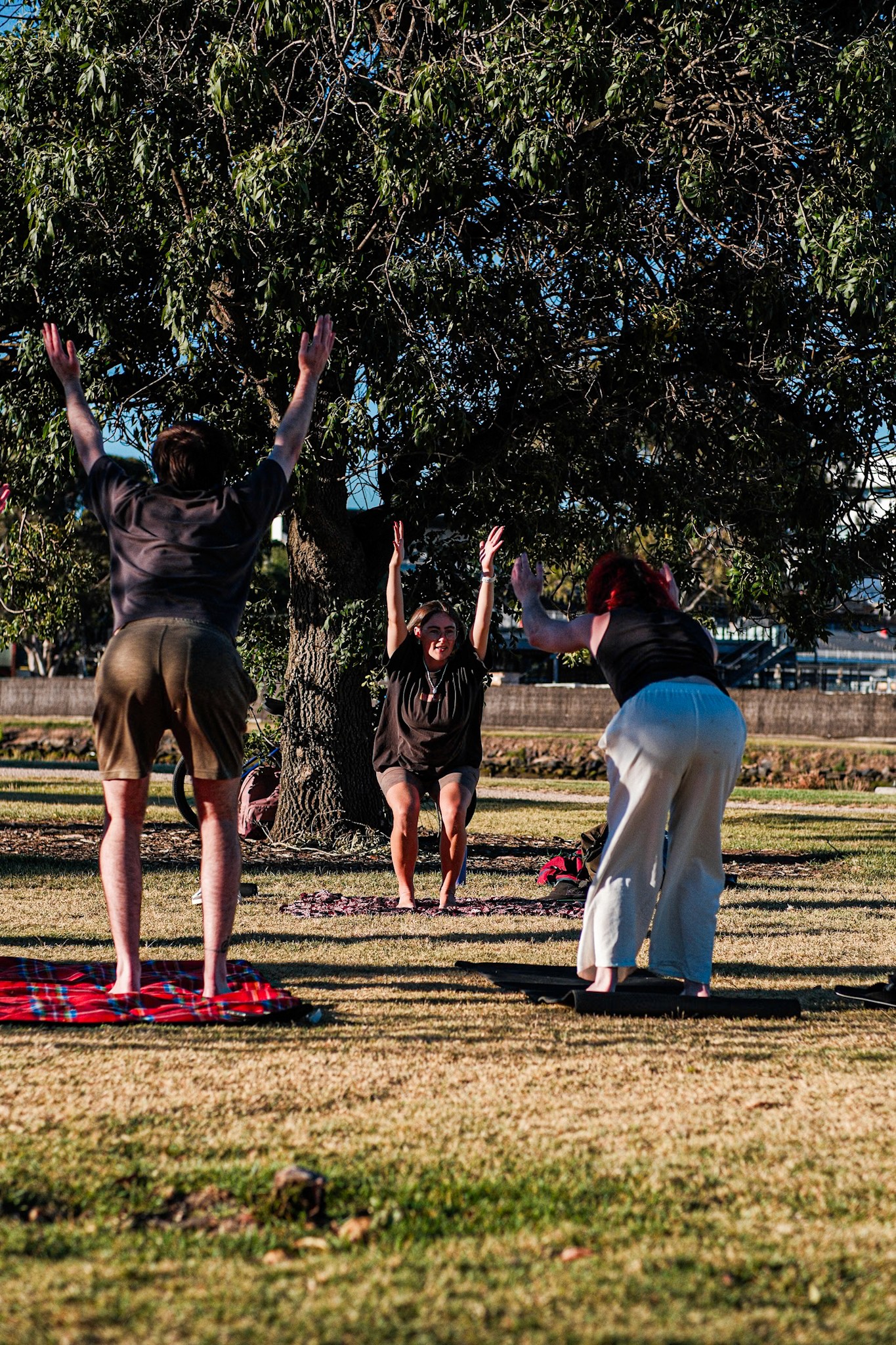 Commercial photography by JamesTheLyon for PixelSpaces — events, gigs, headshots, people, and architecture — park yoga namaste mindfulness grounded local community 