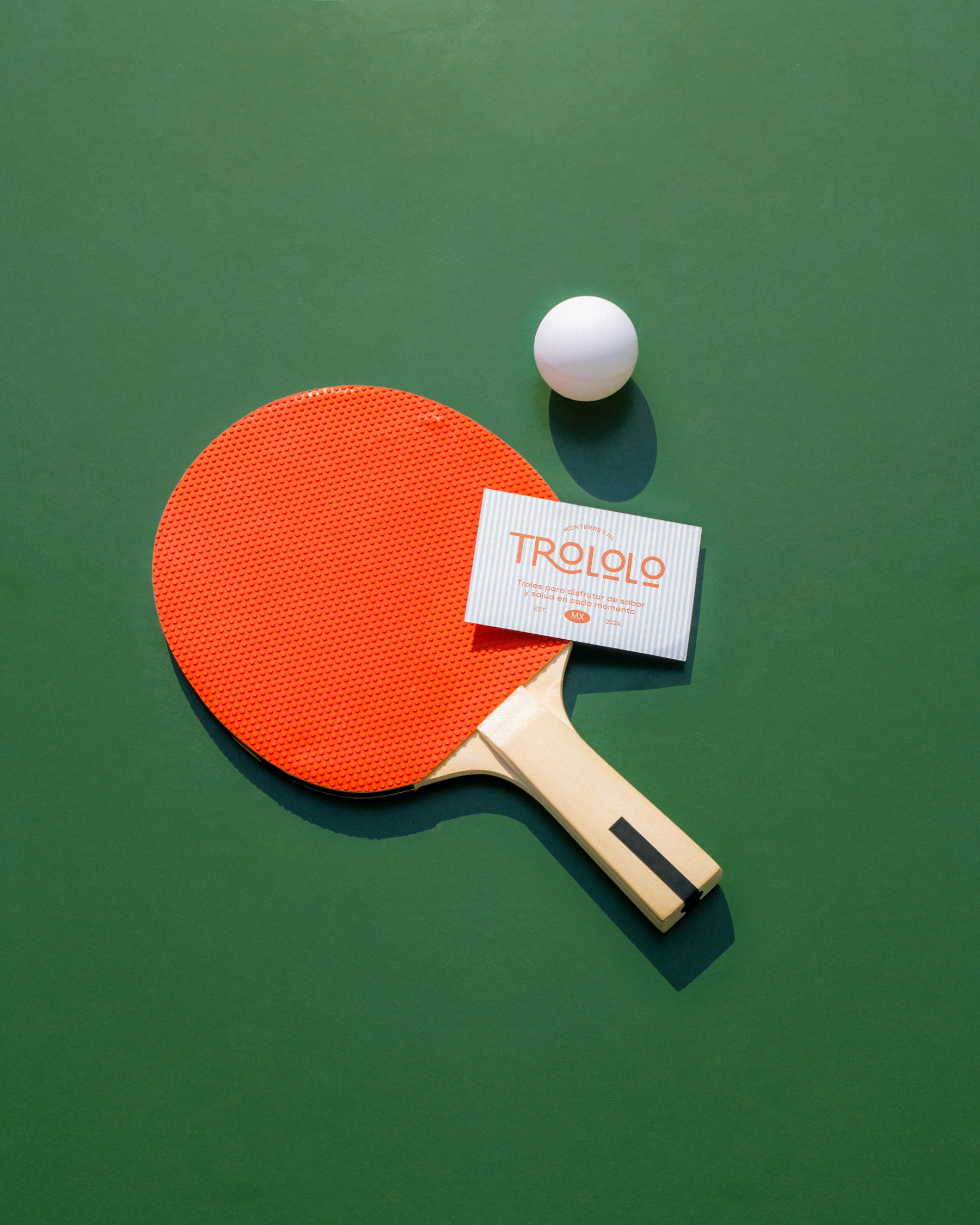 Business card design next to a tennis court