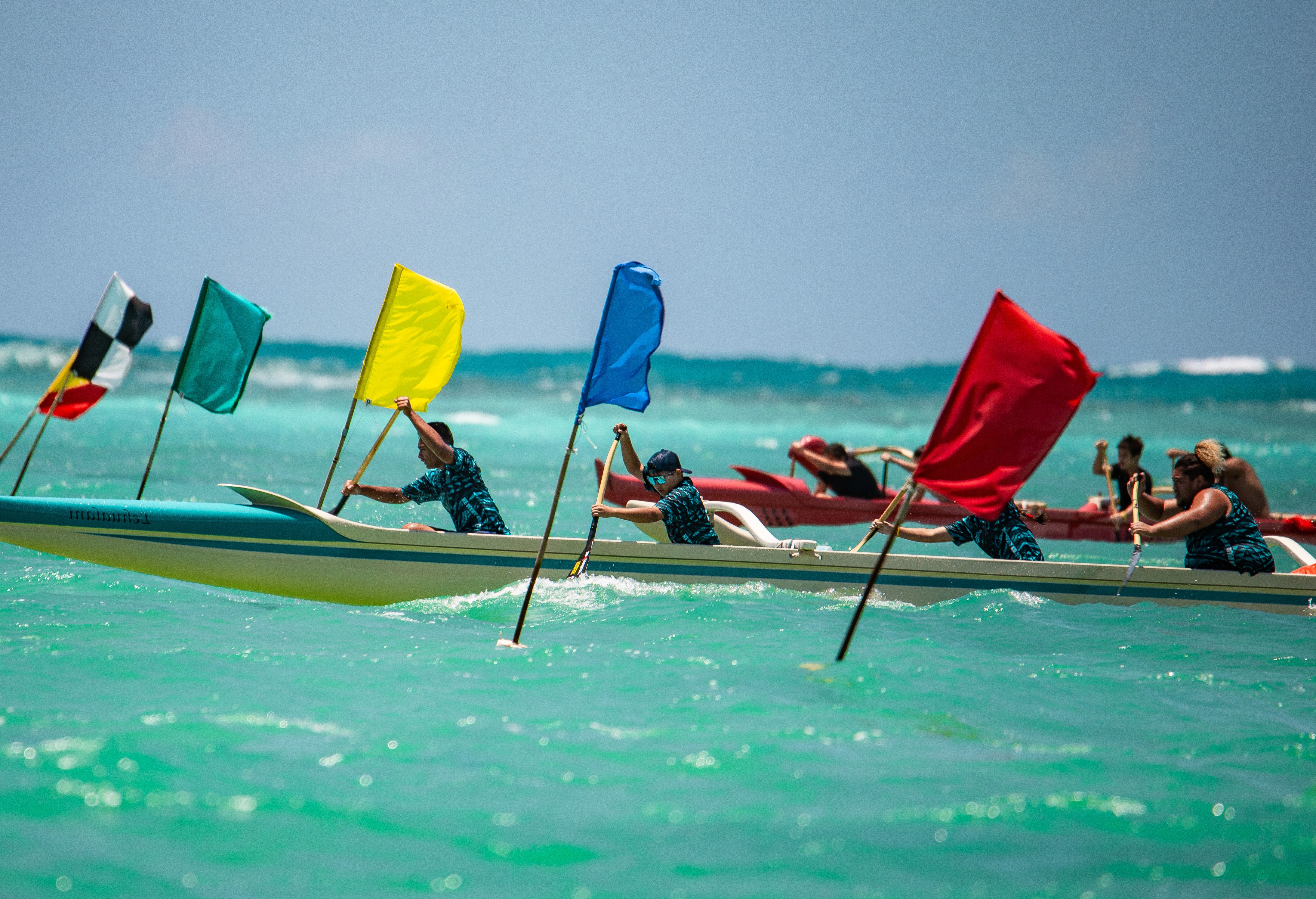 A kid practicing surfing