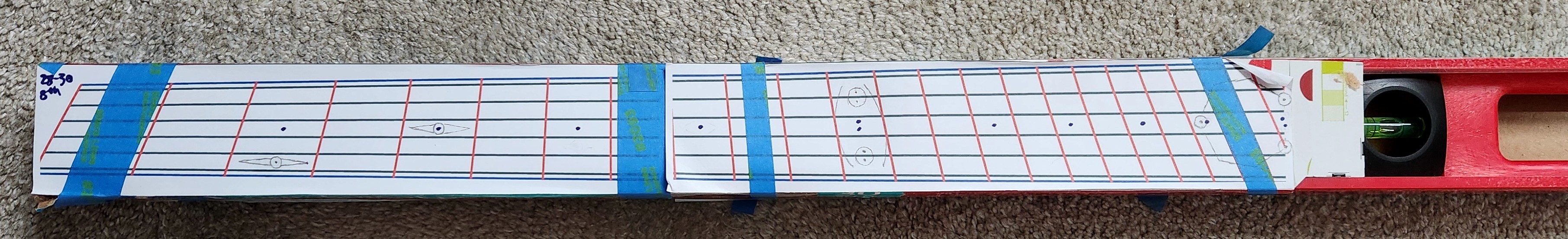 28 to 30 inch multiscale fanned fret fretboard configuration printed at 1:1 scale on measuring level with early inlay concept sketches