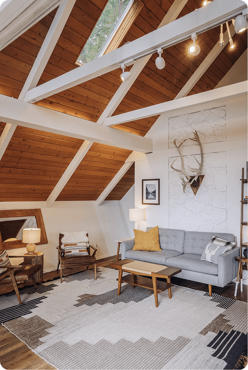 Luxurious marble shower with built-in niche, hexagon mosaic floor tiles, and natural light from Floor & Decor