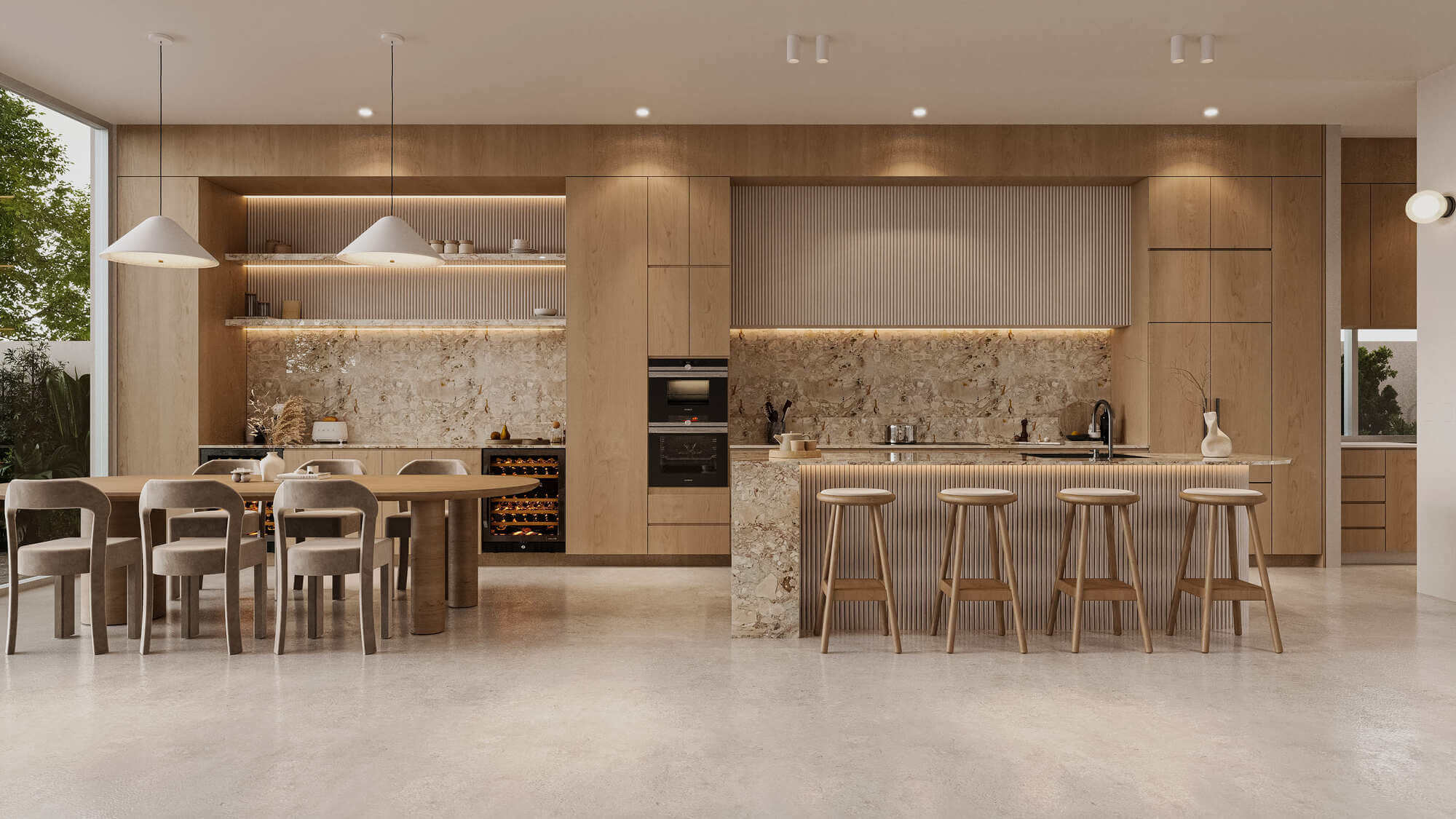 Modern luxury open-plan kitchen interior design with light oak cabinets, stone island, built-in wine fridge, and adjoining dining room table.