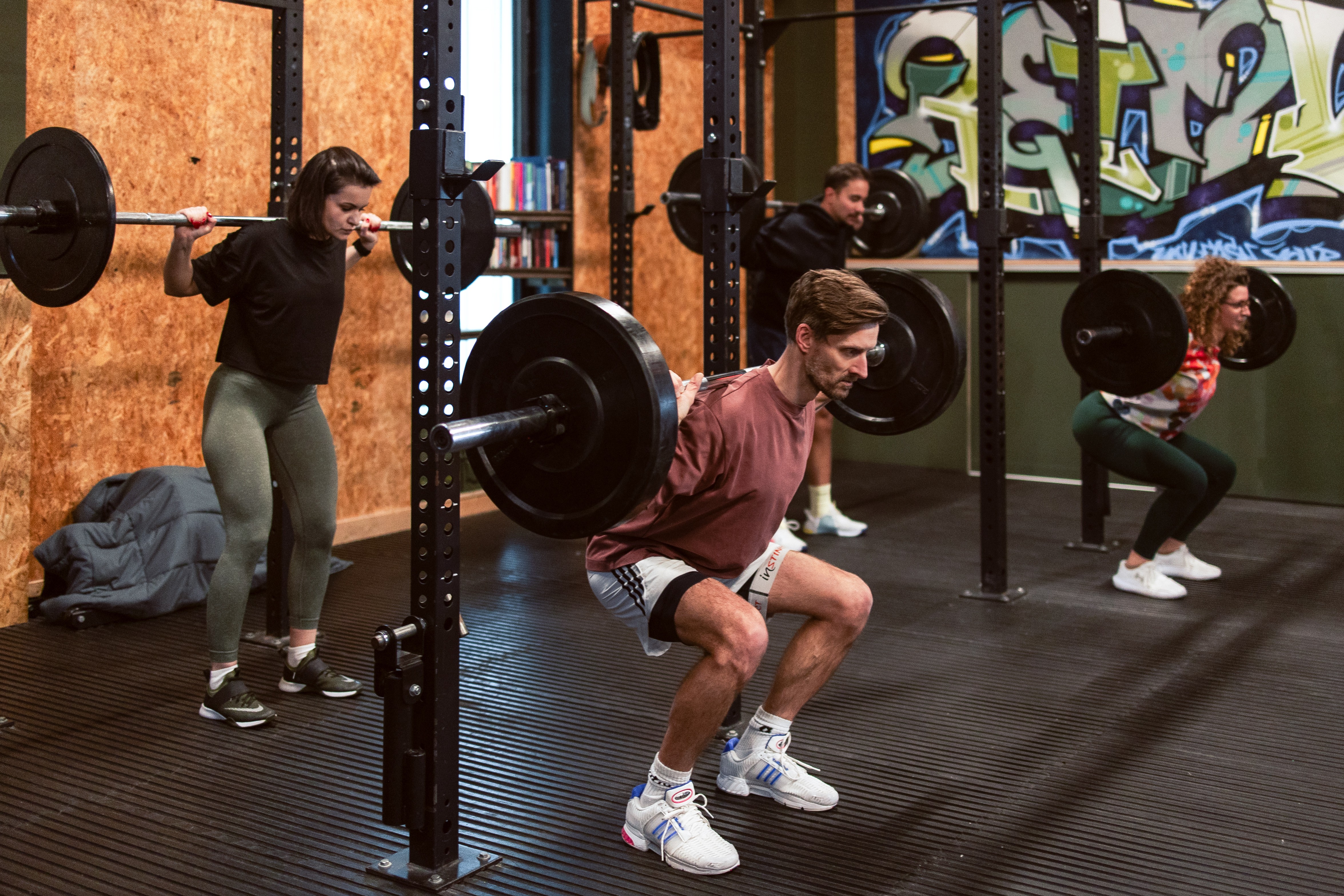 Group of men standing with Sufboard