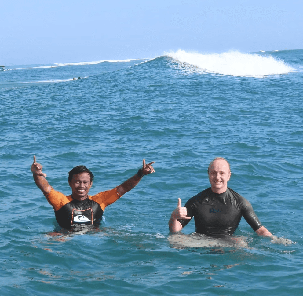 A lady with surfboard