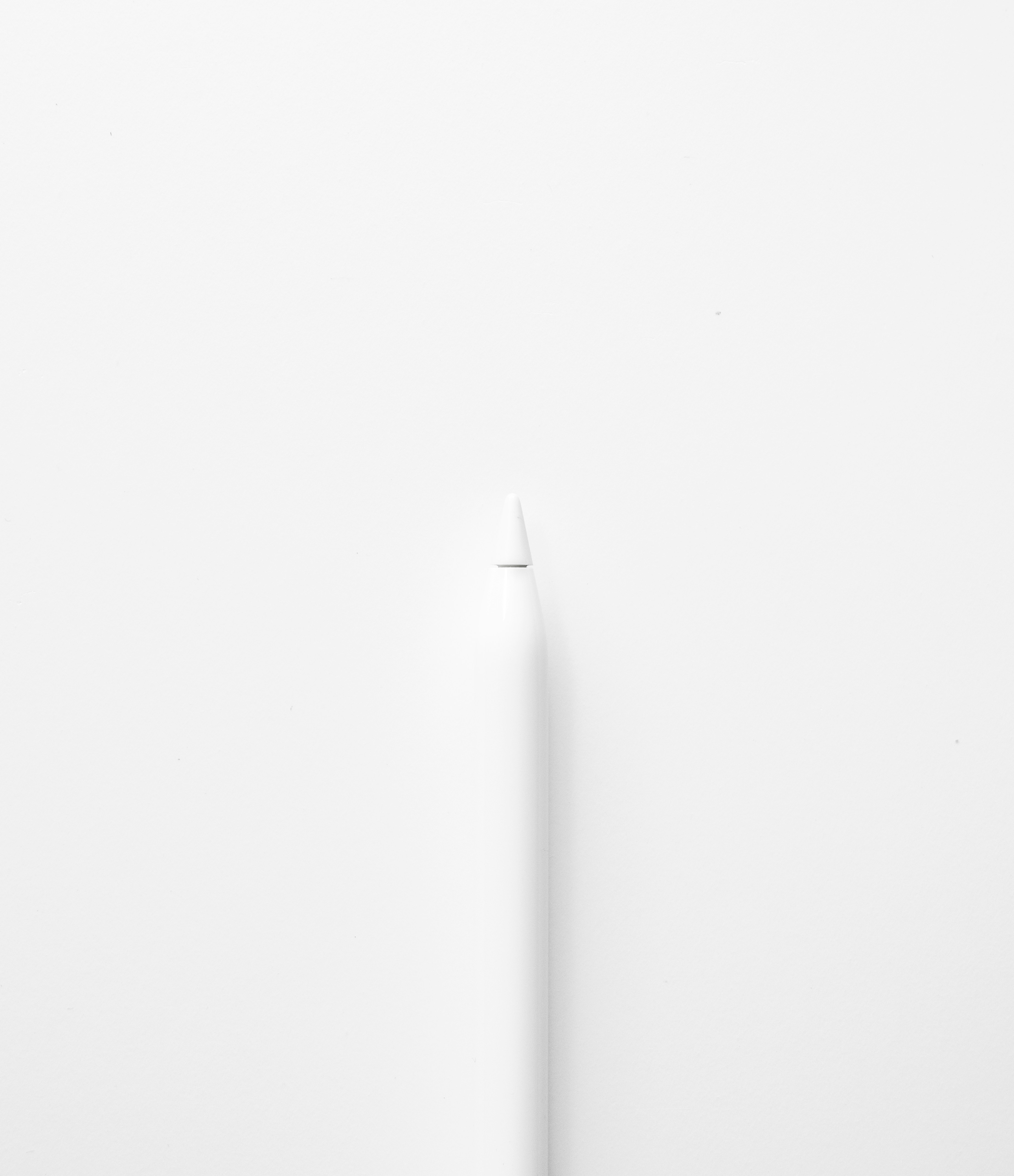 a white pen on a white background