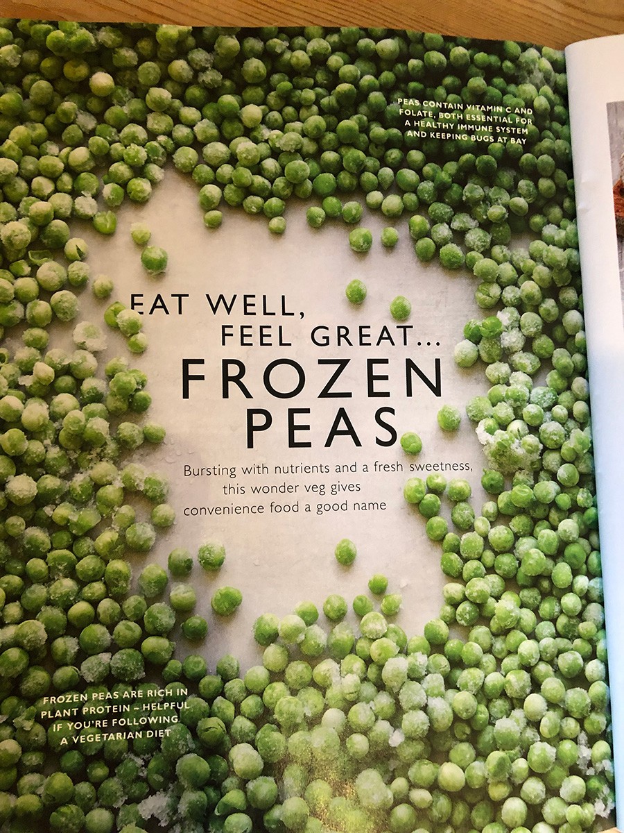 A magazine feature page titled "Eat Well, Feel Great… Frozen Peas" surrounded by a close-up photograph of frozen peas, with nutritional facts highlighted in the corners.