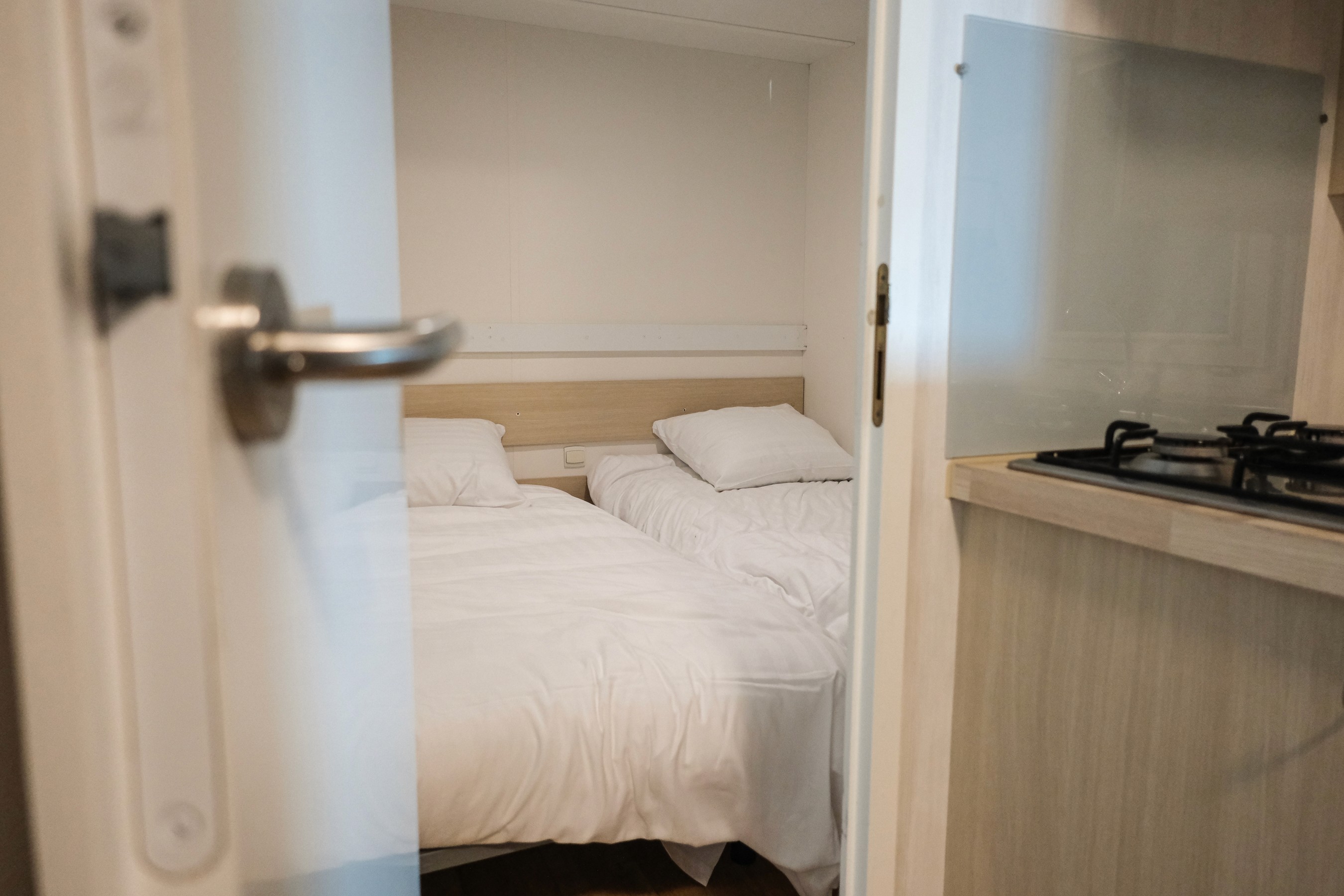 Modern office desk with angular design and leather chair