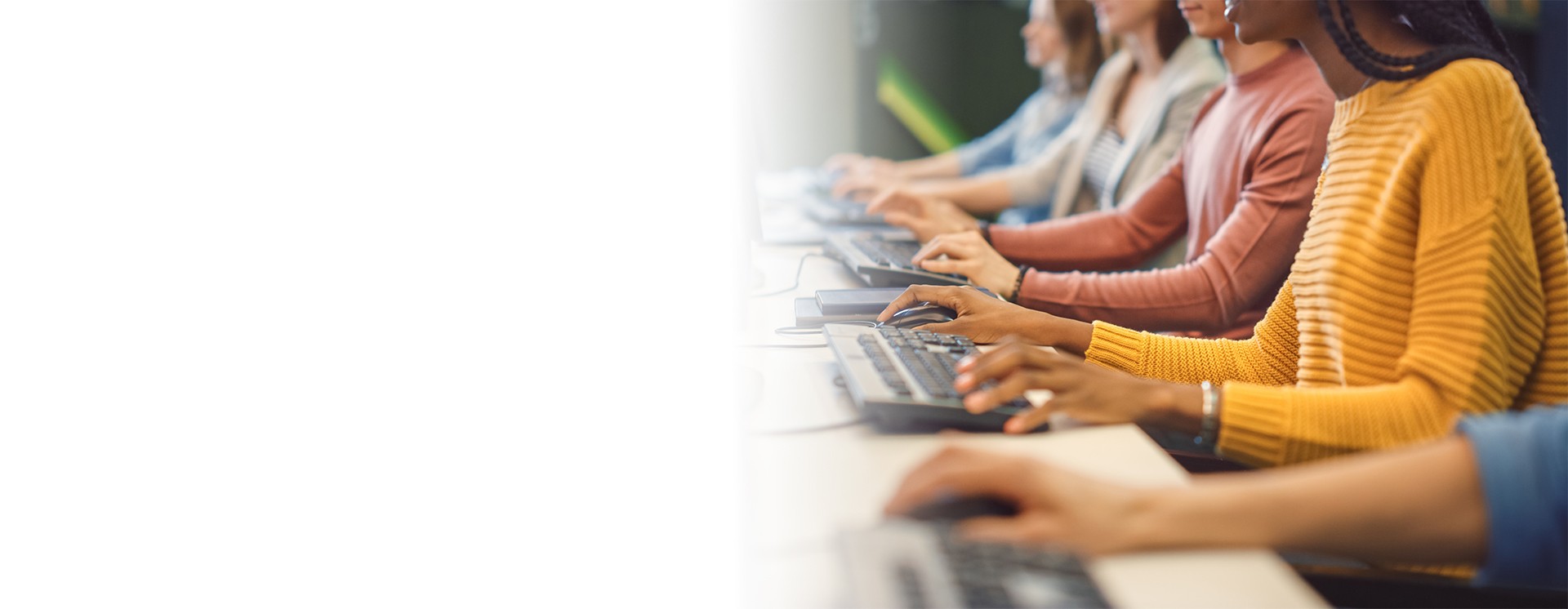 kids lying on a glass land and smiling