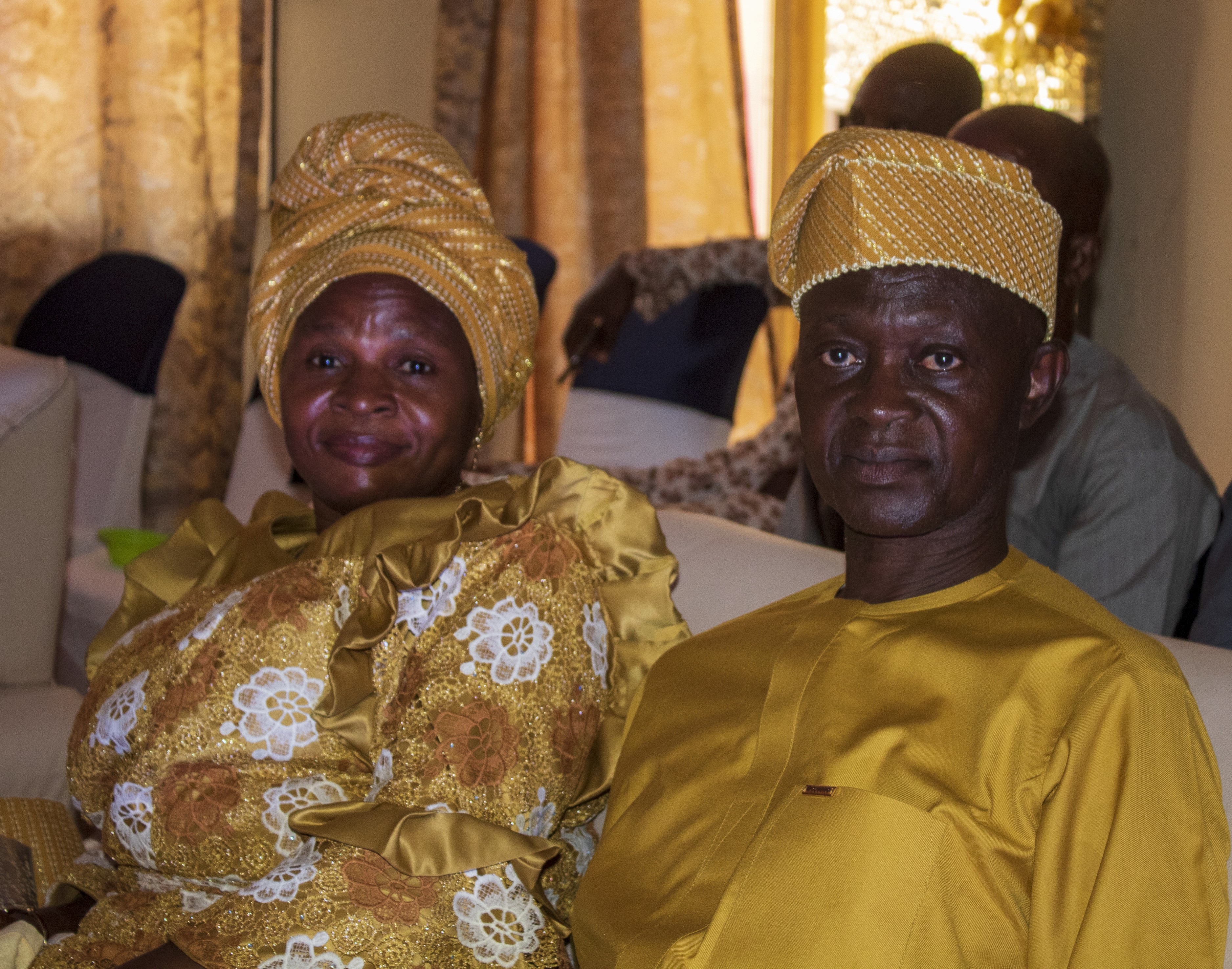 man standing near white wall