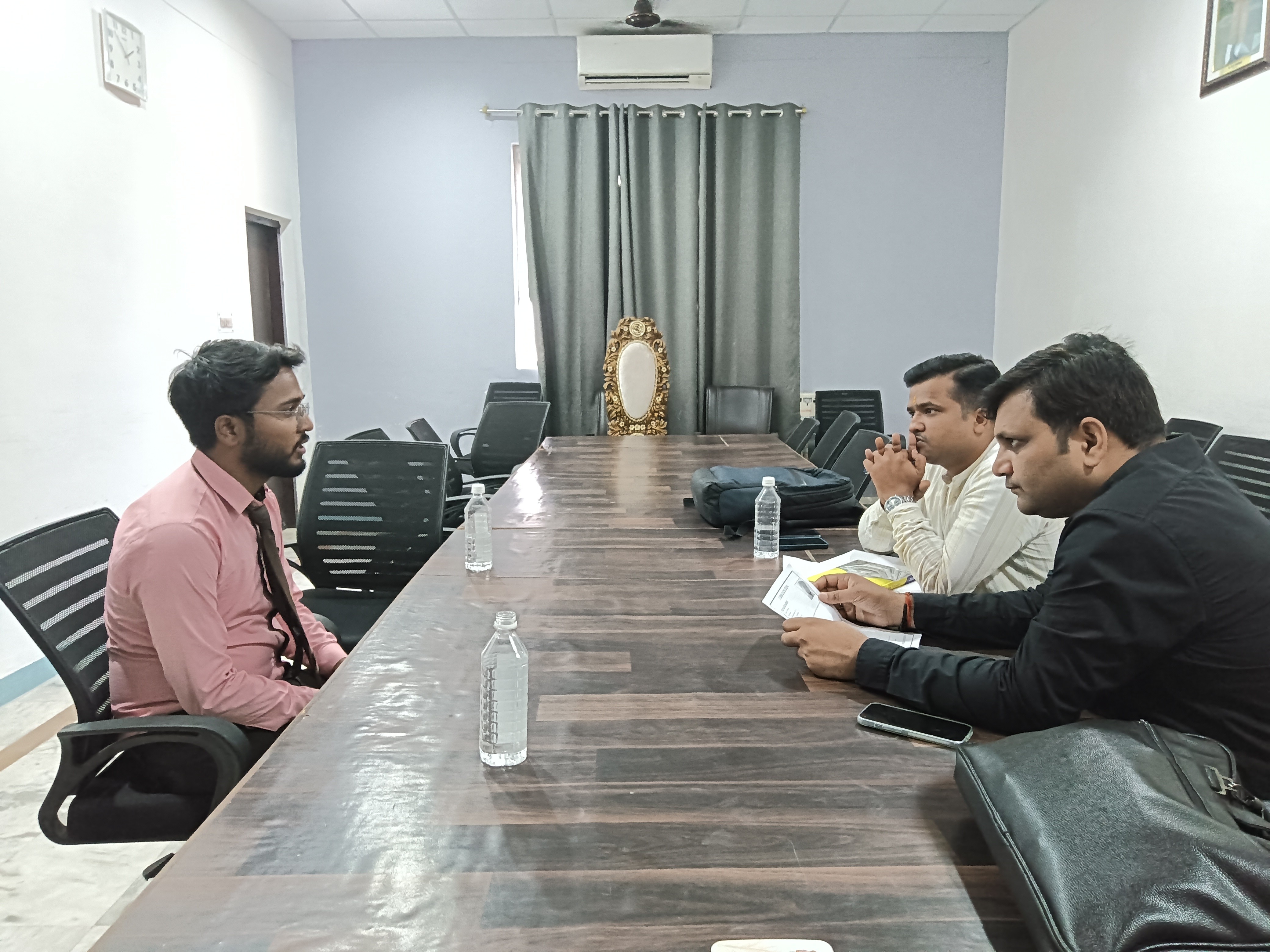 people sitting on chair in front of laptop computers