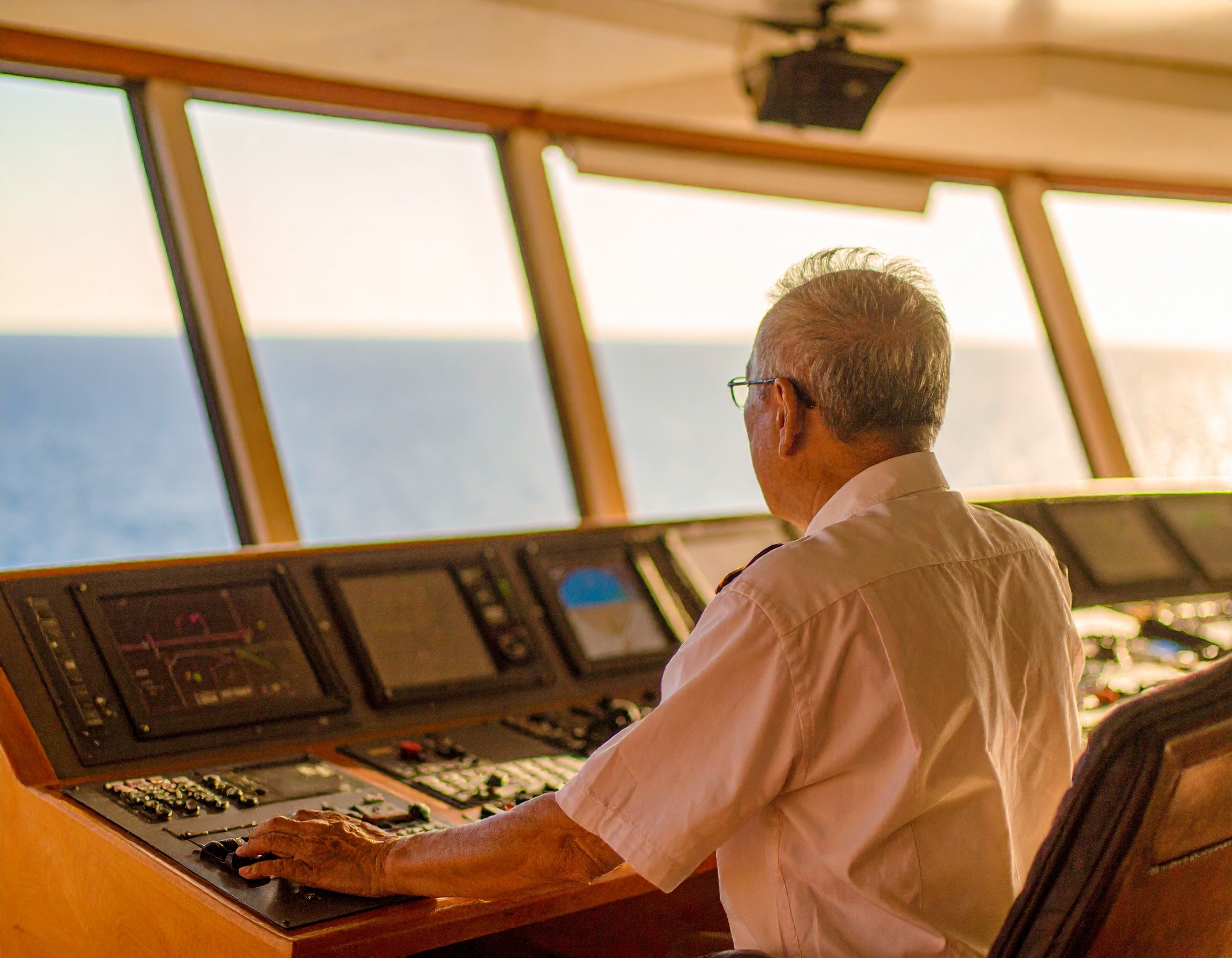 captain in a ship's bridge