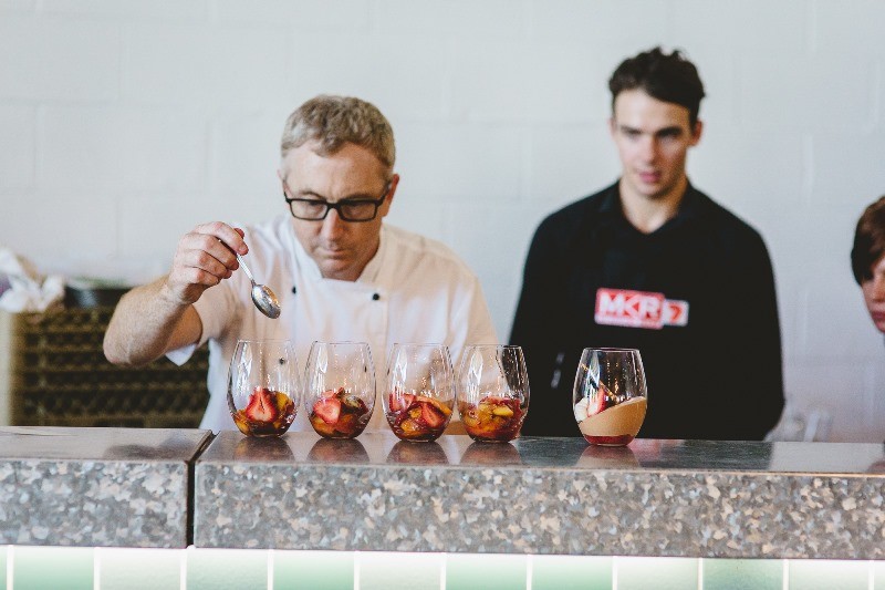 Someone checking items off of a check list