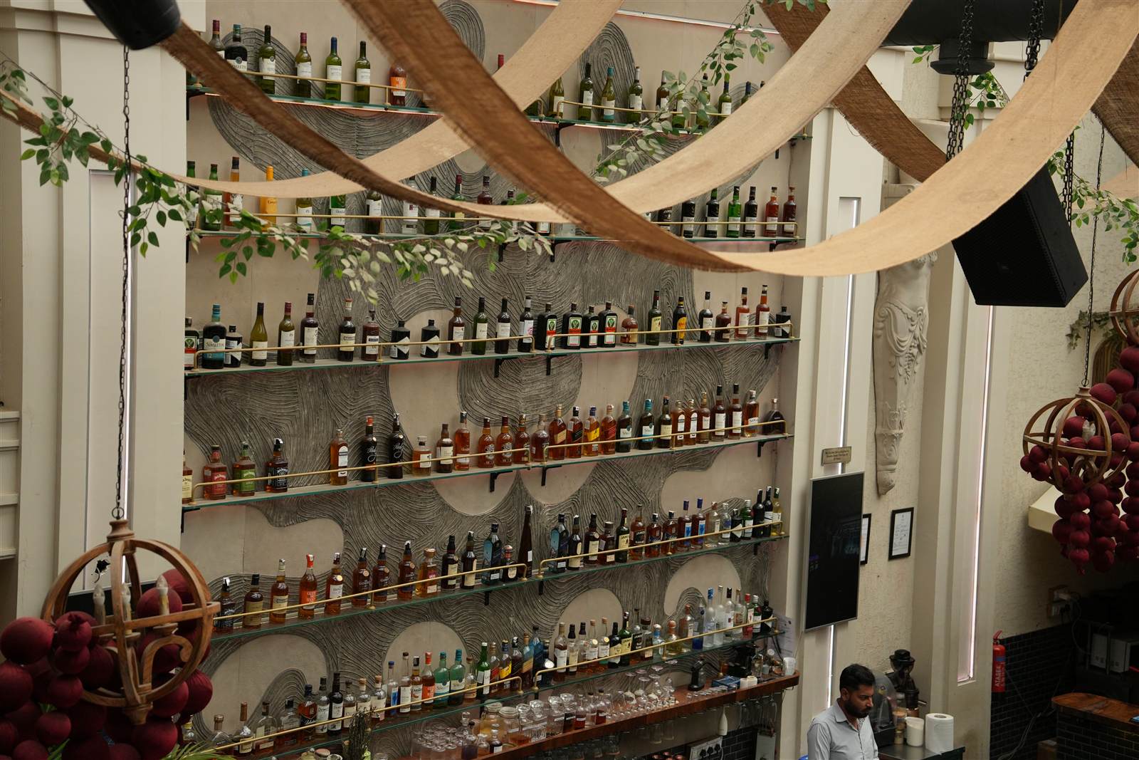 The backlit bottle wall at Seville Bar and Lounge in Sector 26, Chandigarh
