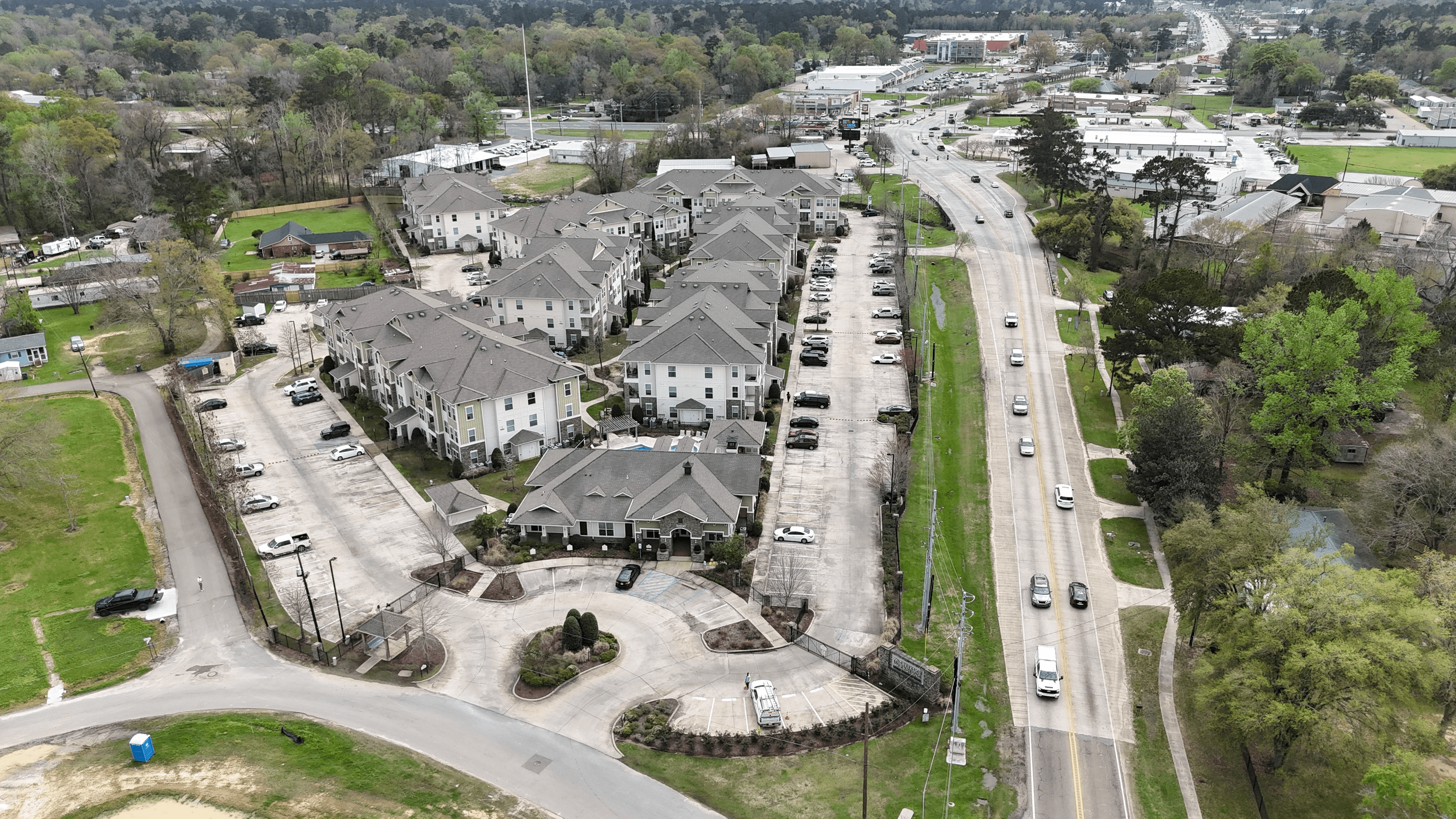 Aerial view of the Creekside Crossing apartment community and leasing center in Walker, Louisiana.