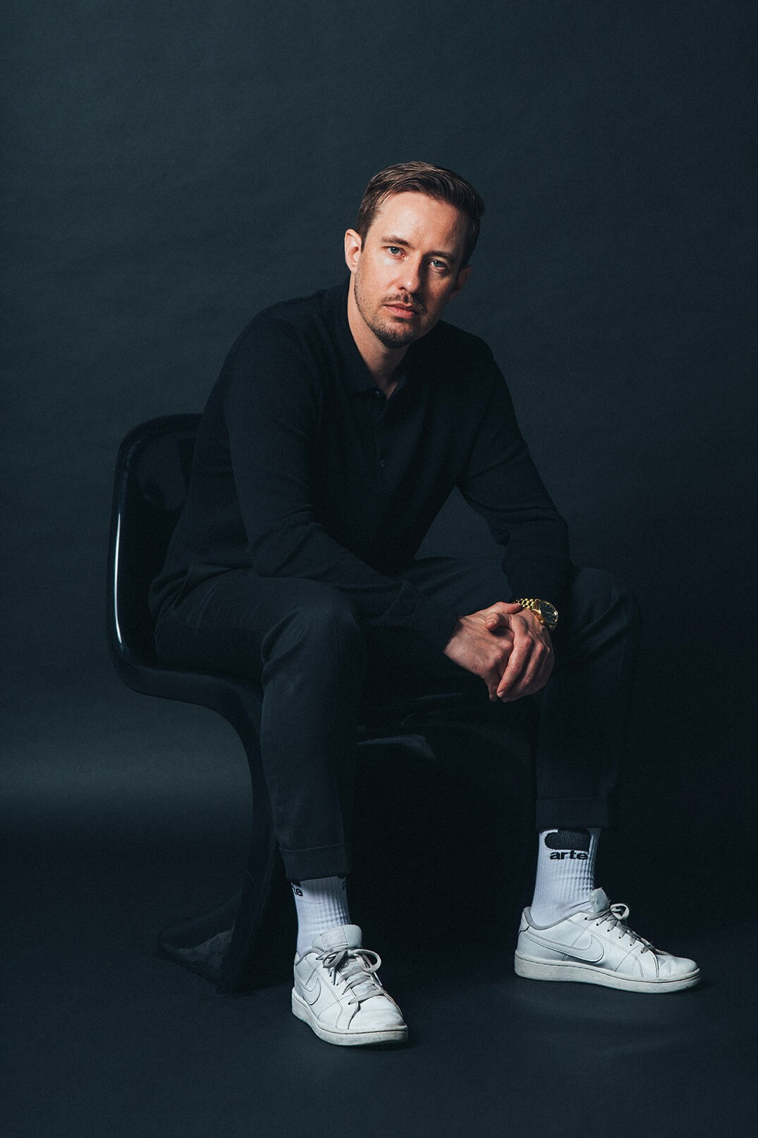 Rachel Stone, personal trainer working out sweaty with a barbell