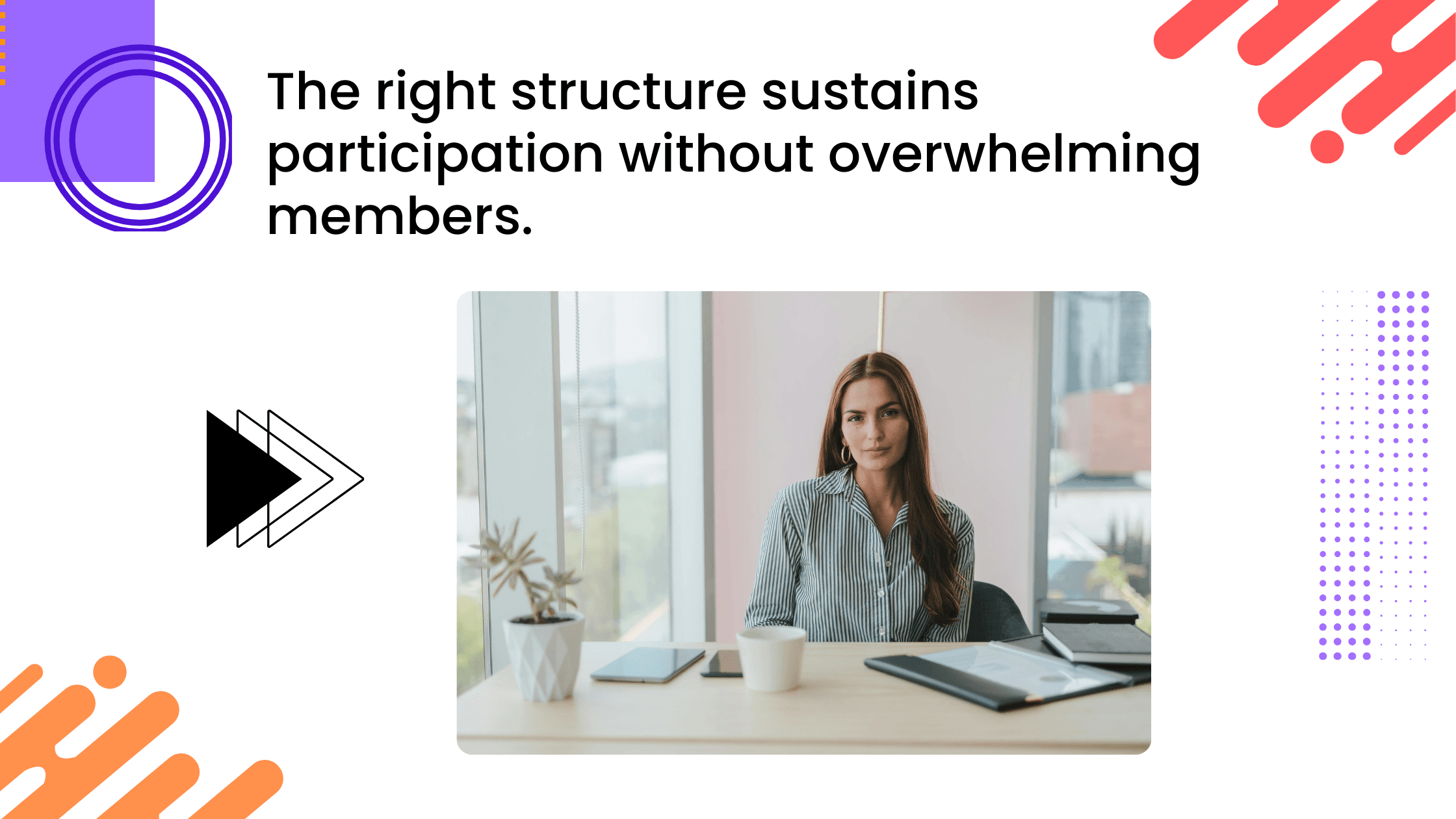 Woman seated at a desk with a laptop and notebook in a bright office setting.
