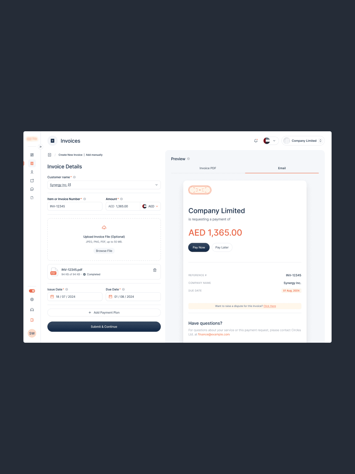 two ladies looking at a laptop and smiling