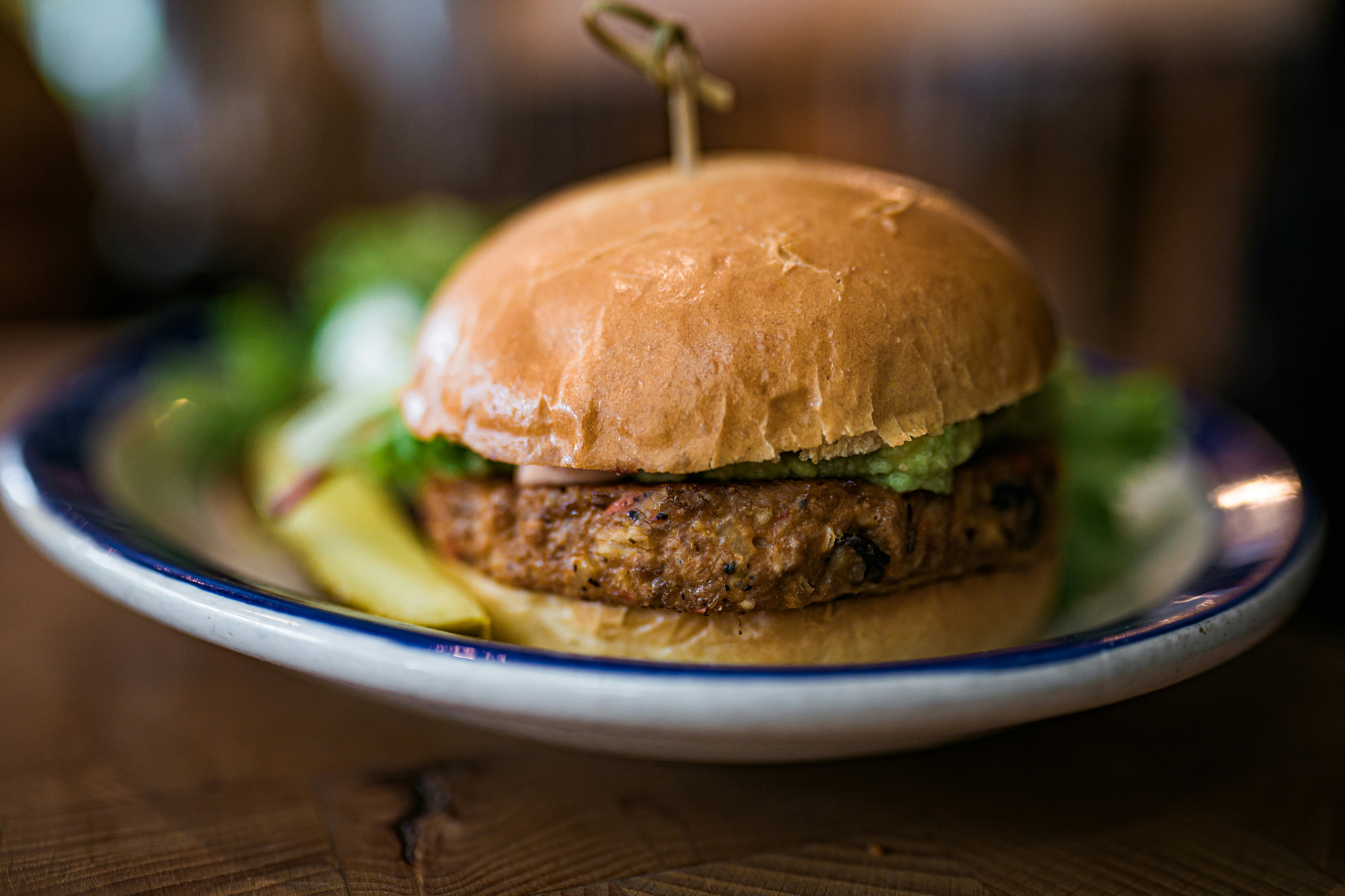 burger on white ceramic plate