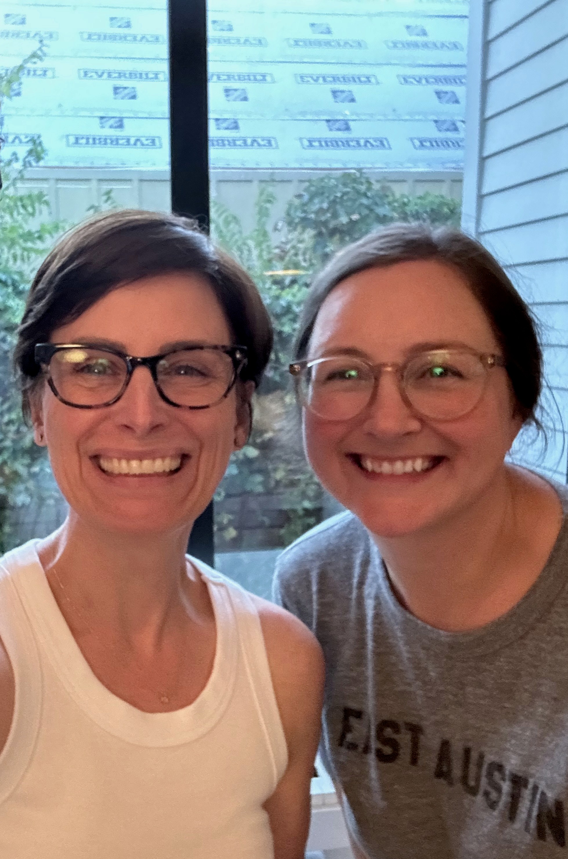 Emily Cherkin and Julie Liddell smiling for a photograph