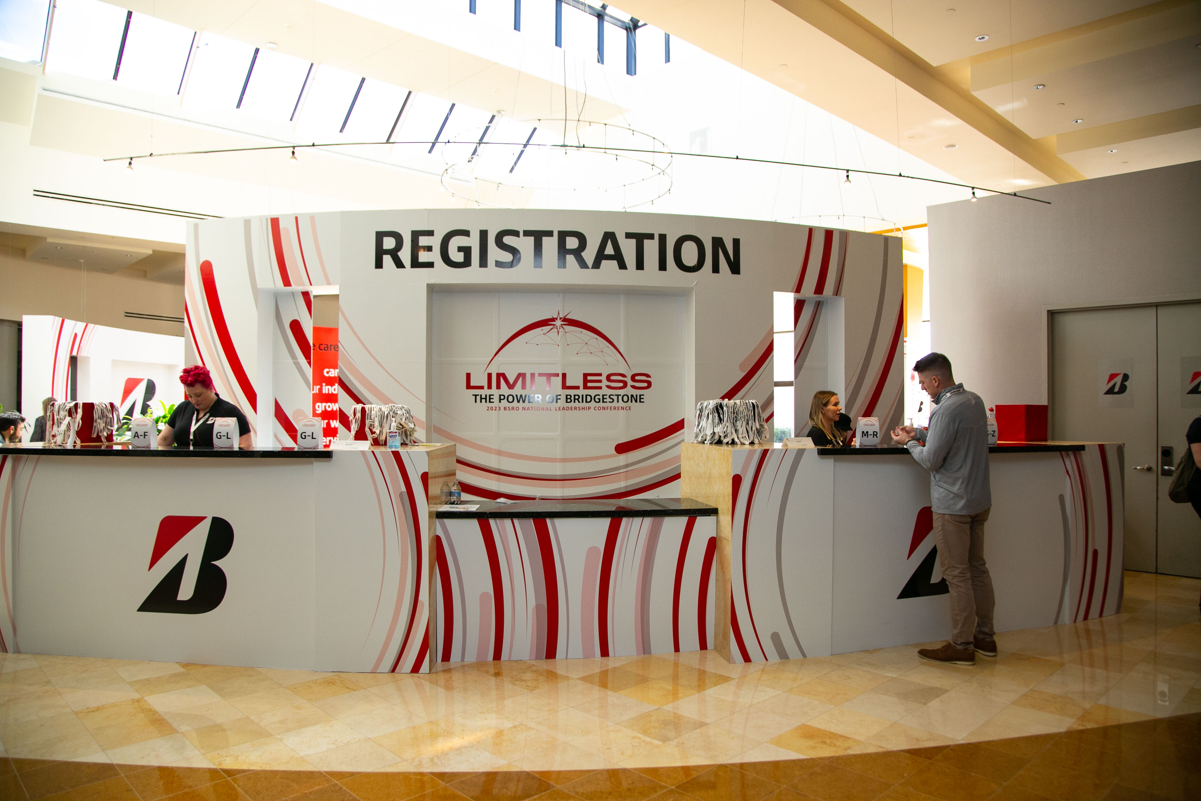 Bridgestone registration desk with themed graphics