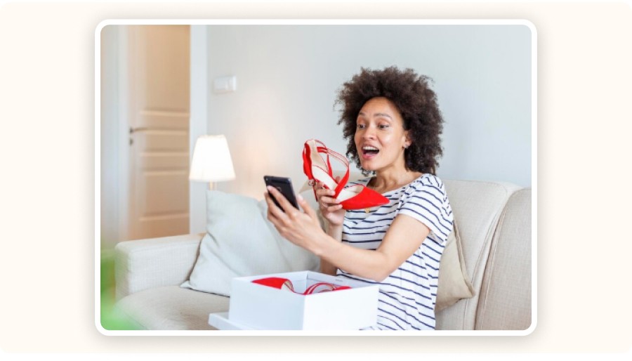 Red shoes in front of smartphone