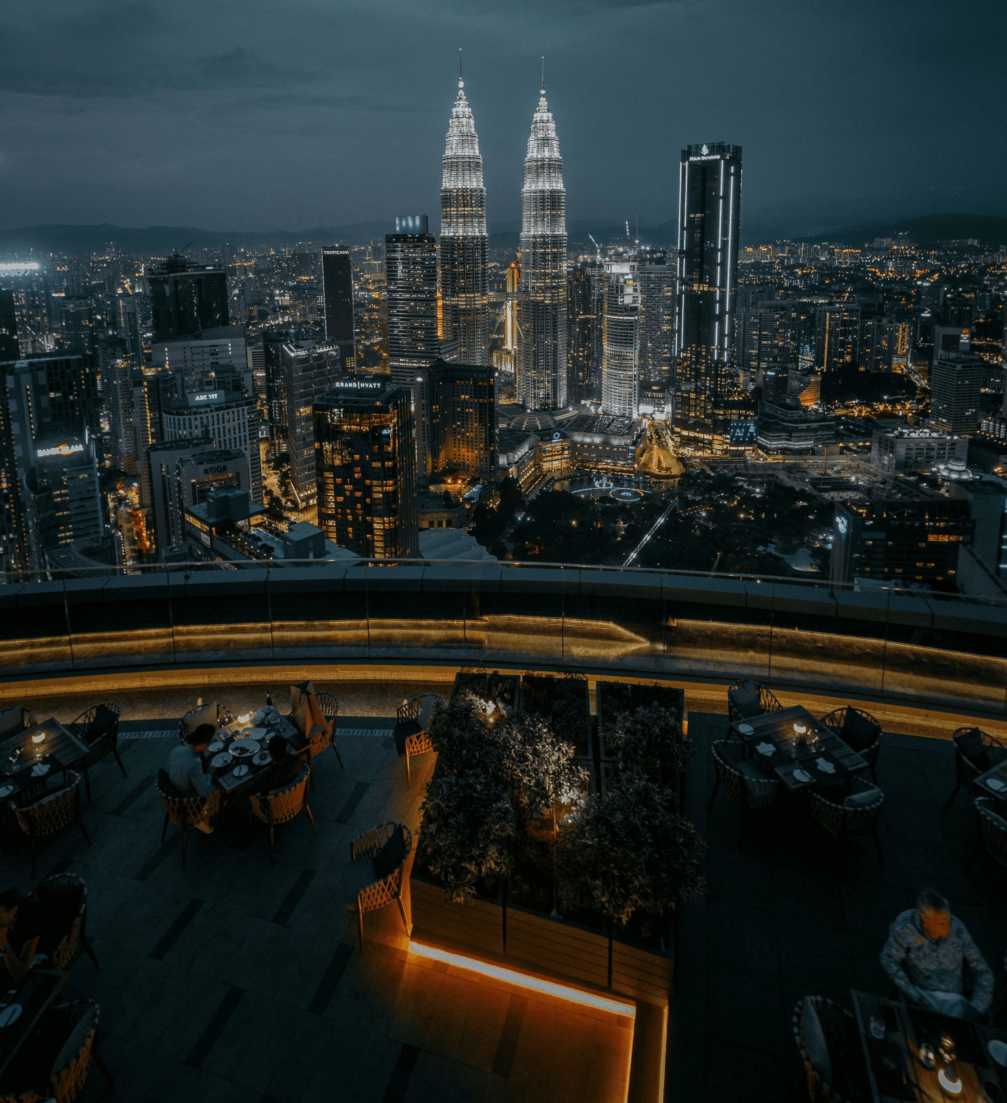 city with high rise buildings during night time