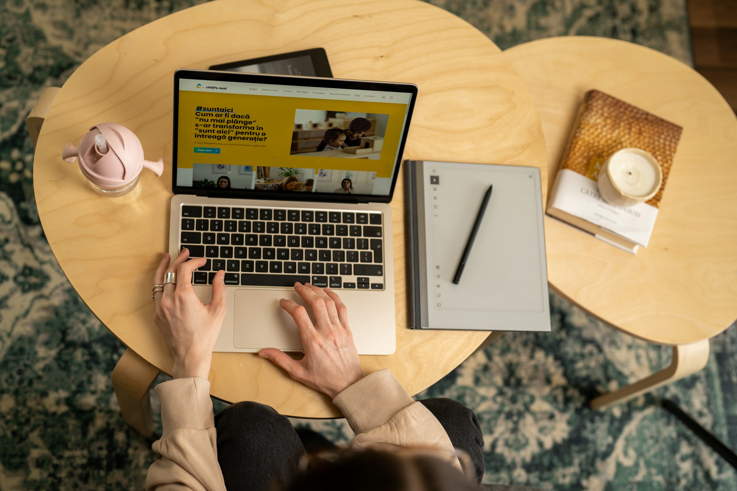 person looking at laptop - Shopify Web Design