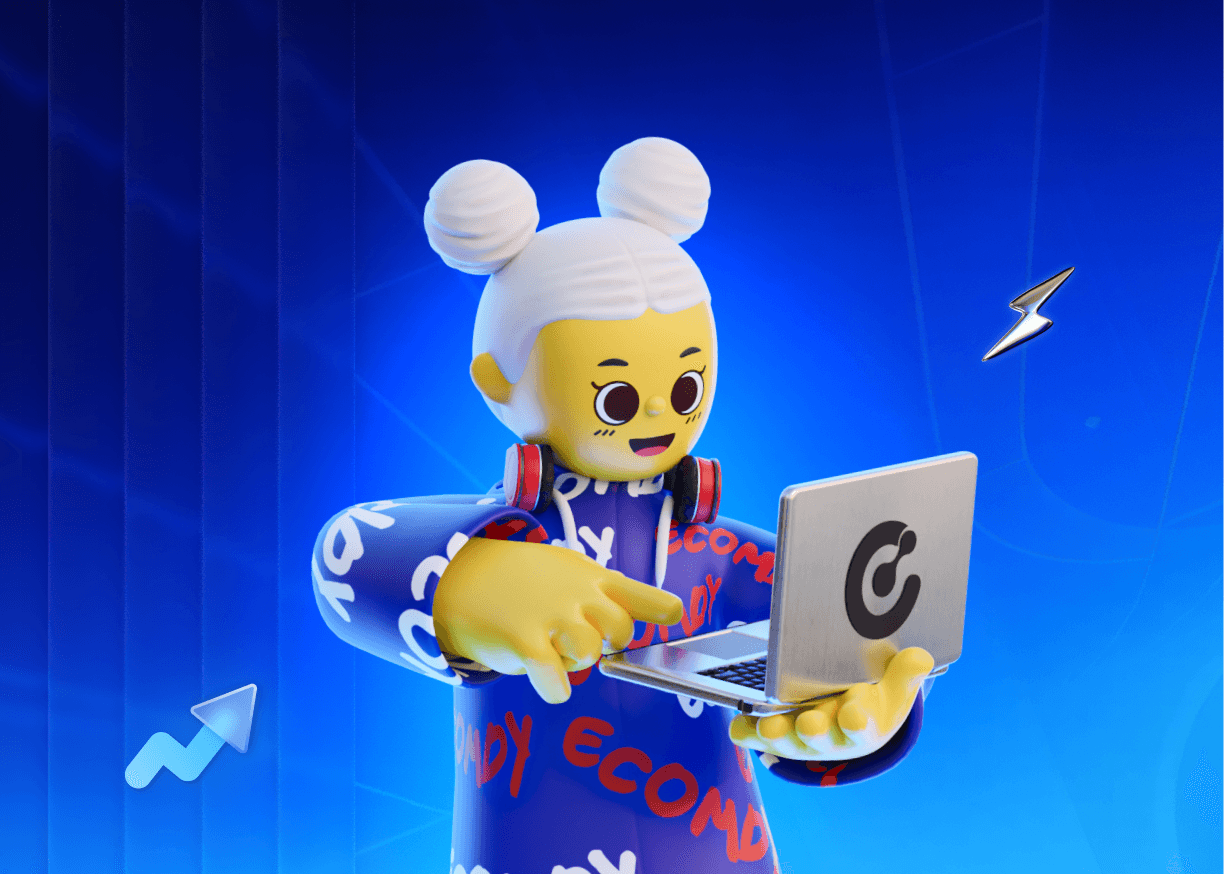 two women sitting at a table looking at a computer screen