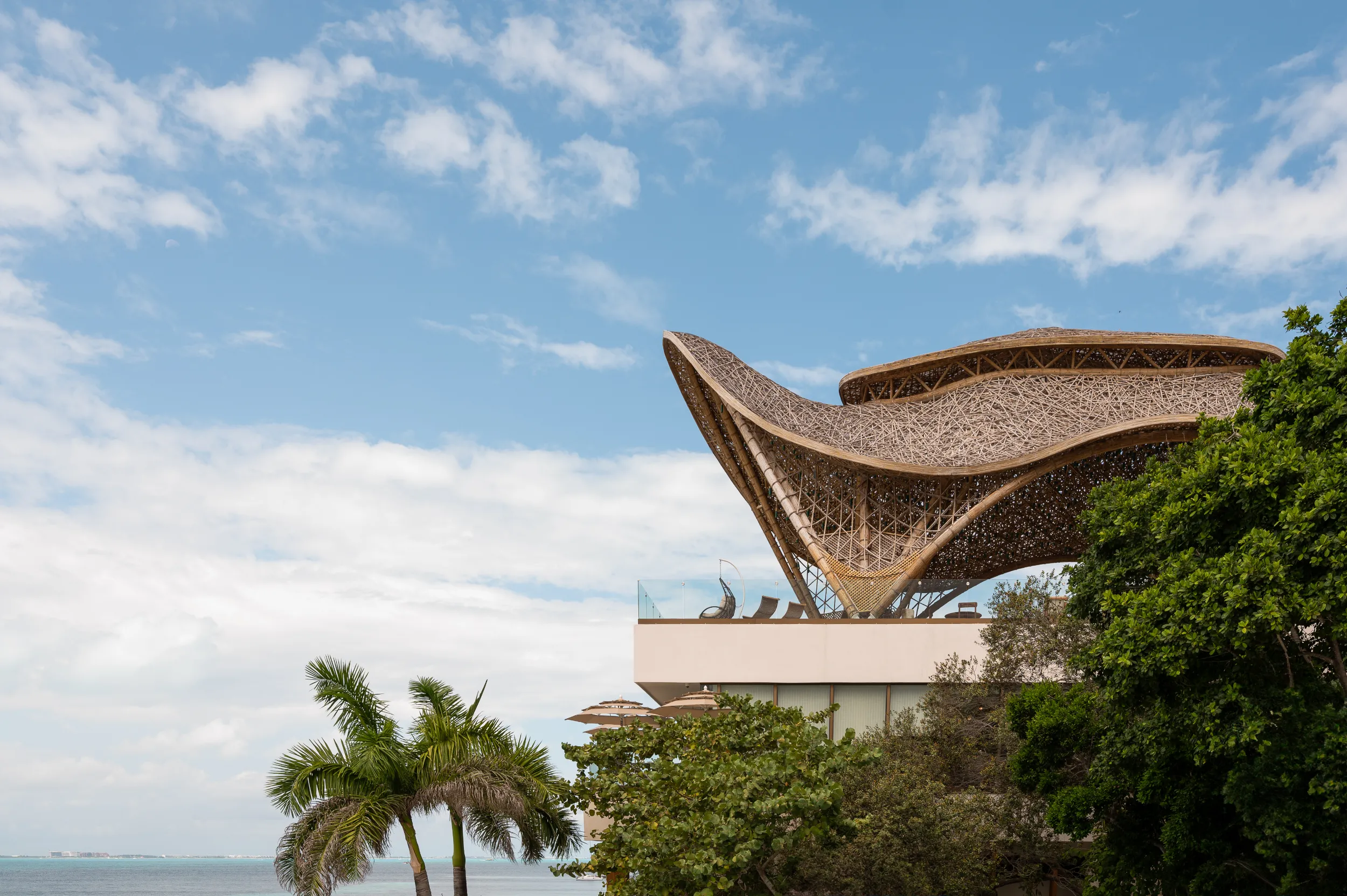 Bioparametric bamboo rooftop temple structure at Hyatt Impressions Isla Mujeres, designed by Arquitectura Mixta.