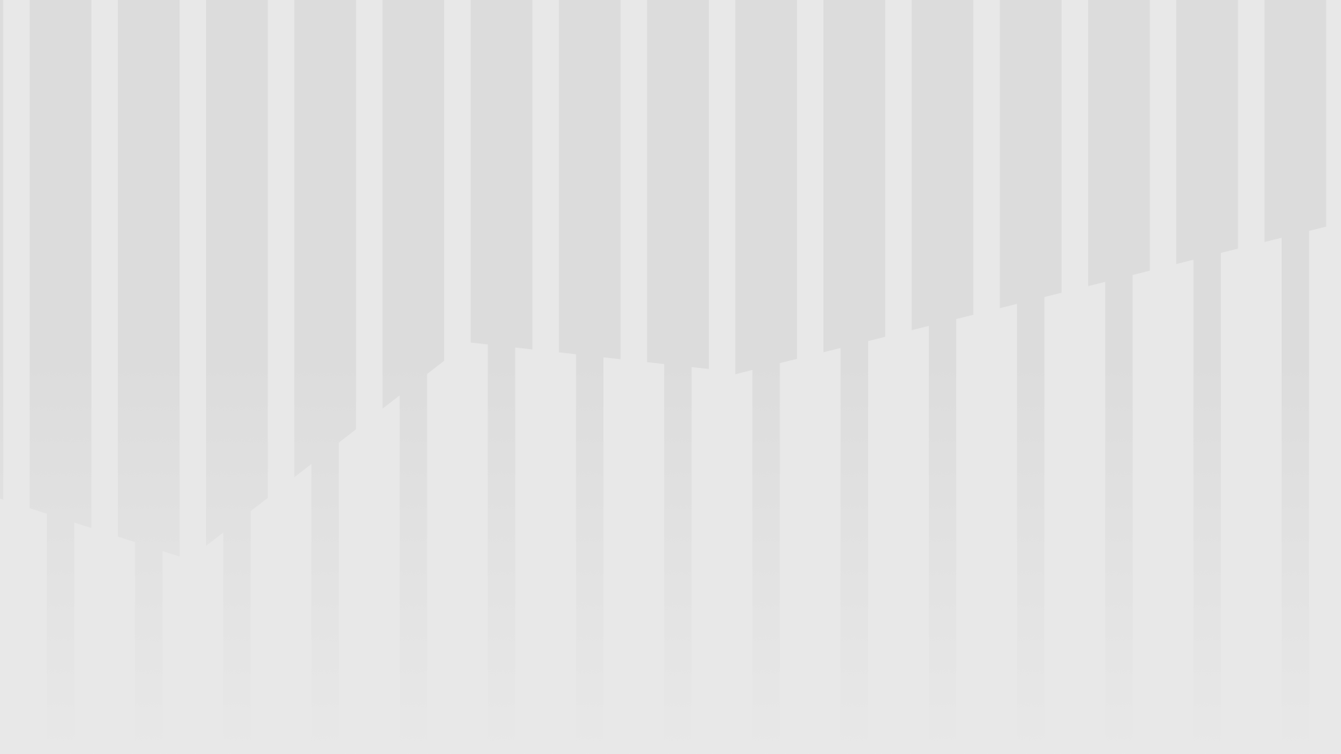 The image displays a close-up view of piano keys, showcasing the black and white keys in an angled perspective, highlighting the texture and alignment.