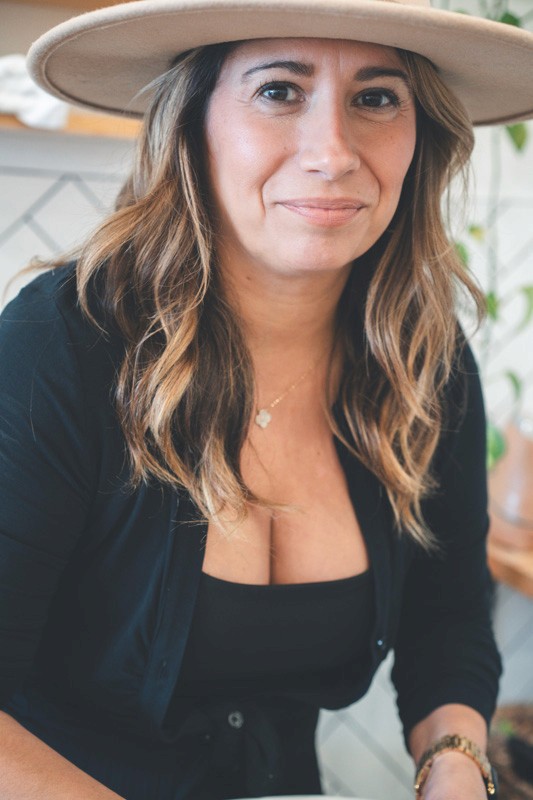 Portrait of Tannya Speir, Owner, Master Stylist, Color Specialist, and Extension Expert at Del Sol Hair Studio.