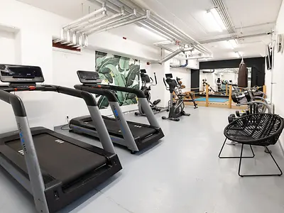 Gym in student accommodation in Darmstadt with cardio and fitness equipment