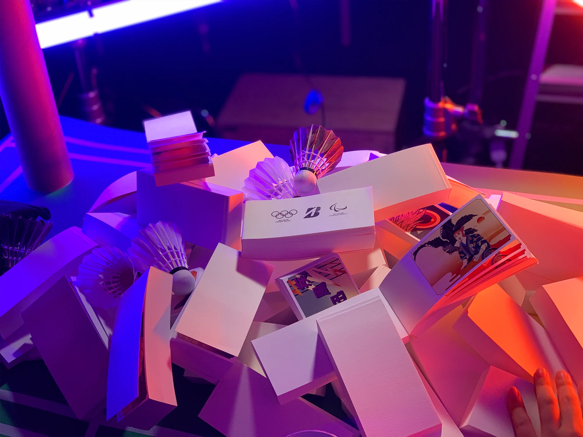 Behind-the-scenes photo from Bridgestone Chase Your Dream showing printed campaign materials and artwork displayed at an event.