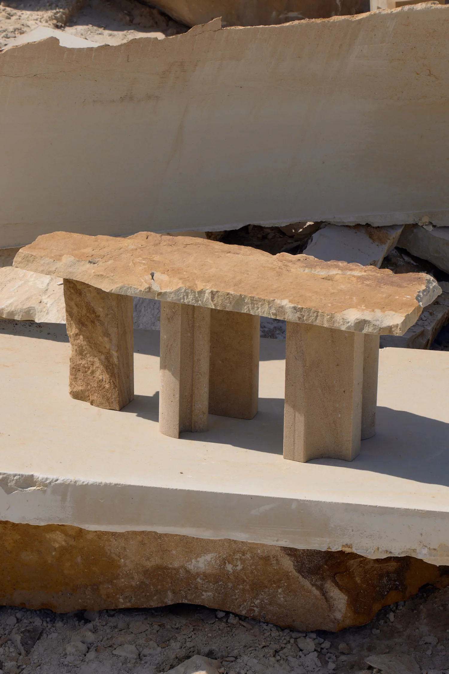 Sand Preludium III quartz sandstone coffee table with elongated top and solid legs by Jiri Krejcirik