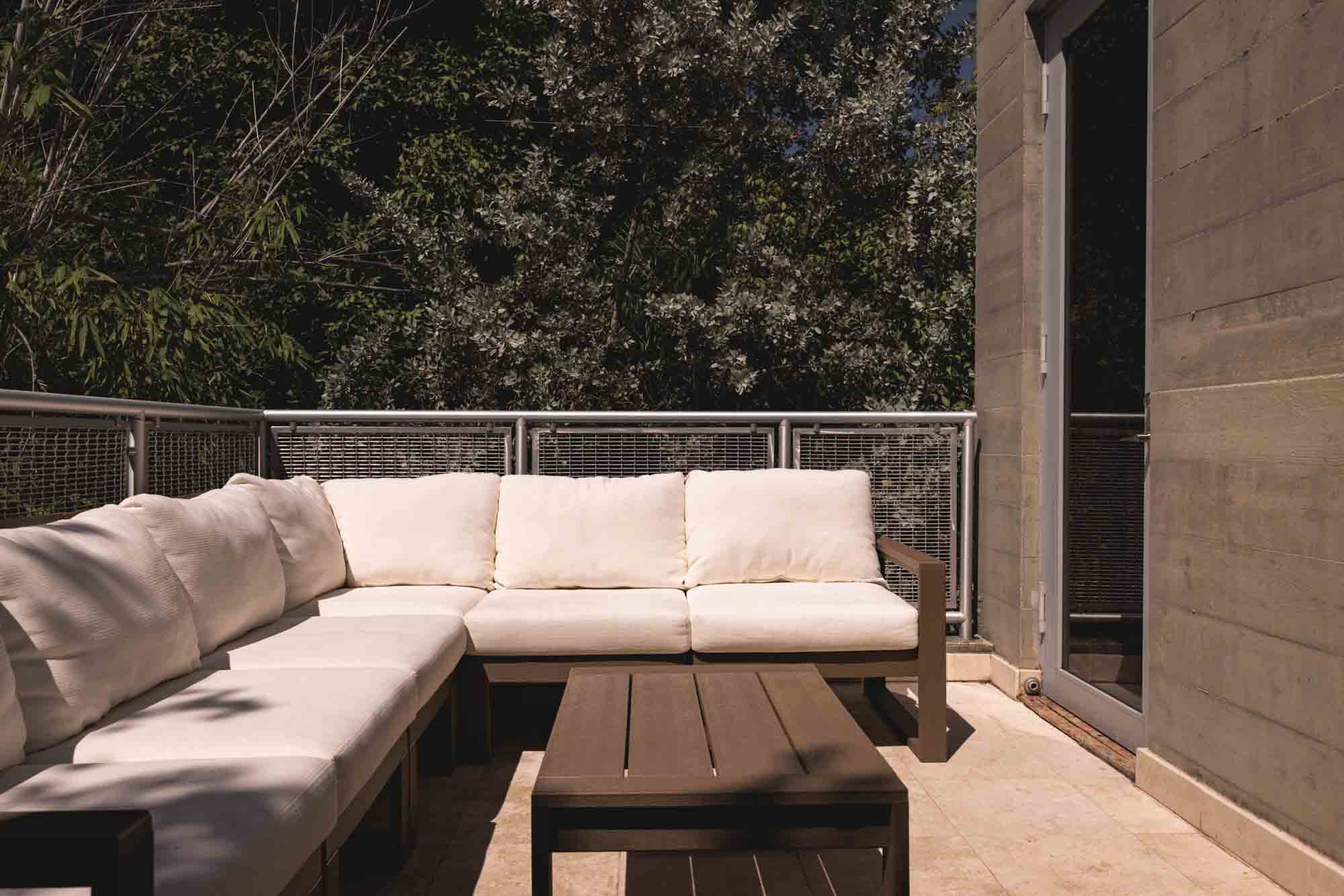 rooftop deck with sweeping views of Old Town, a highlight of this exclusive Key West sanctuary