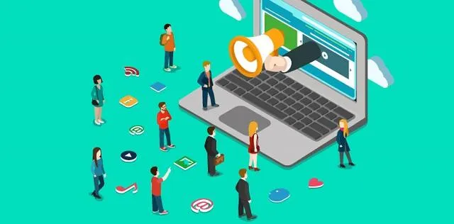 An isometric illustration on a teal background depicting digital marketing or online communication. A large laptop screen shows a hand holding a megaphone, seemingly broadcasting to a diverse group of people standing around the laptop, with various social media and internet icons floating around them.